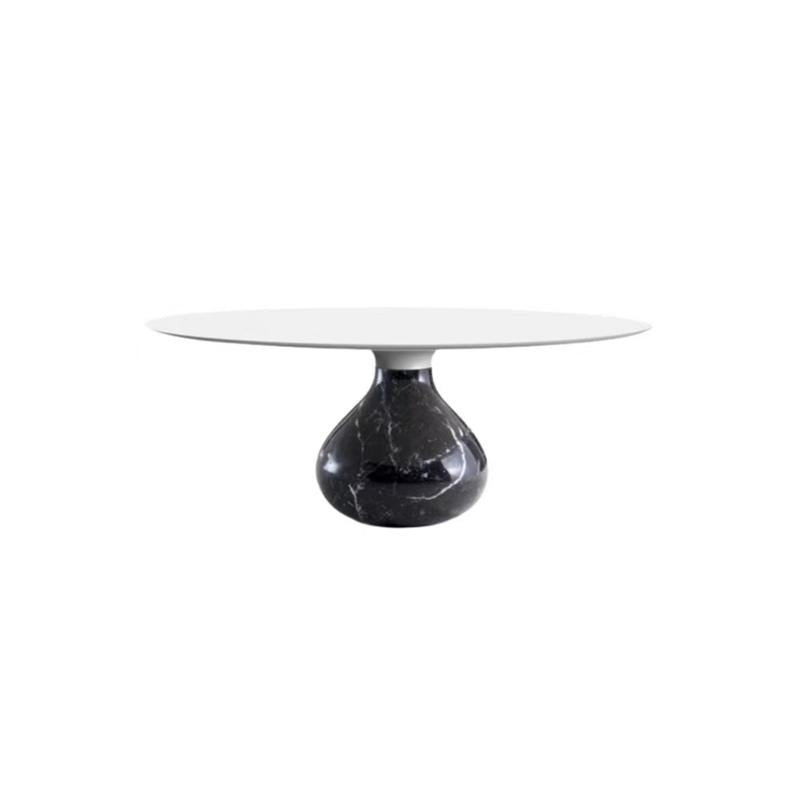 Round table with white flat top and glossy black marble base featuring natural veining; single pedestal support connects top to base; minimalist design for dining or display; smooth surfaces, no visible hardware or embellishments; Category: Furniture > Tables > Dining Tables
