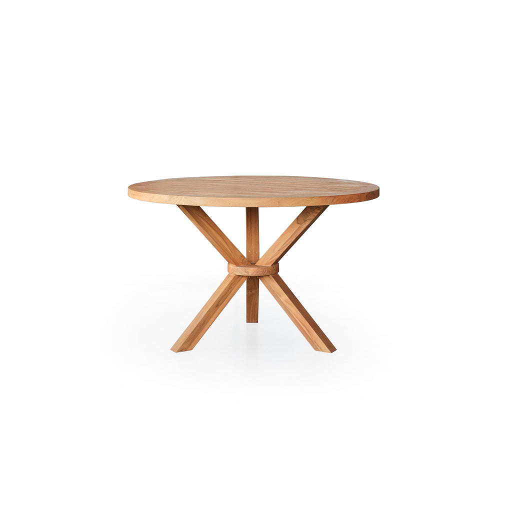 Round wooden dining table with a flat circular top and four angled legs meeting at a central support ring. Natural wood grain and light finish visible. Intended for dining or seating. Category: furniture/dining-tables