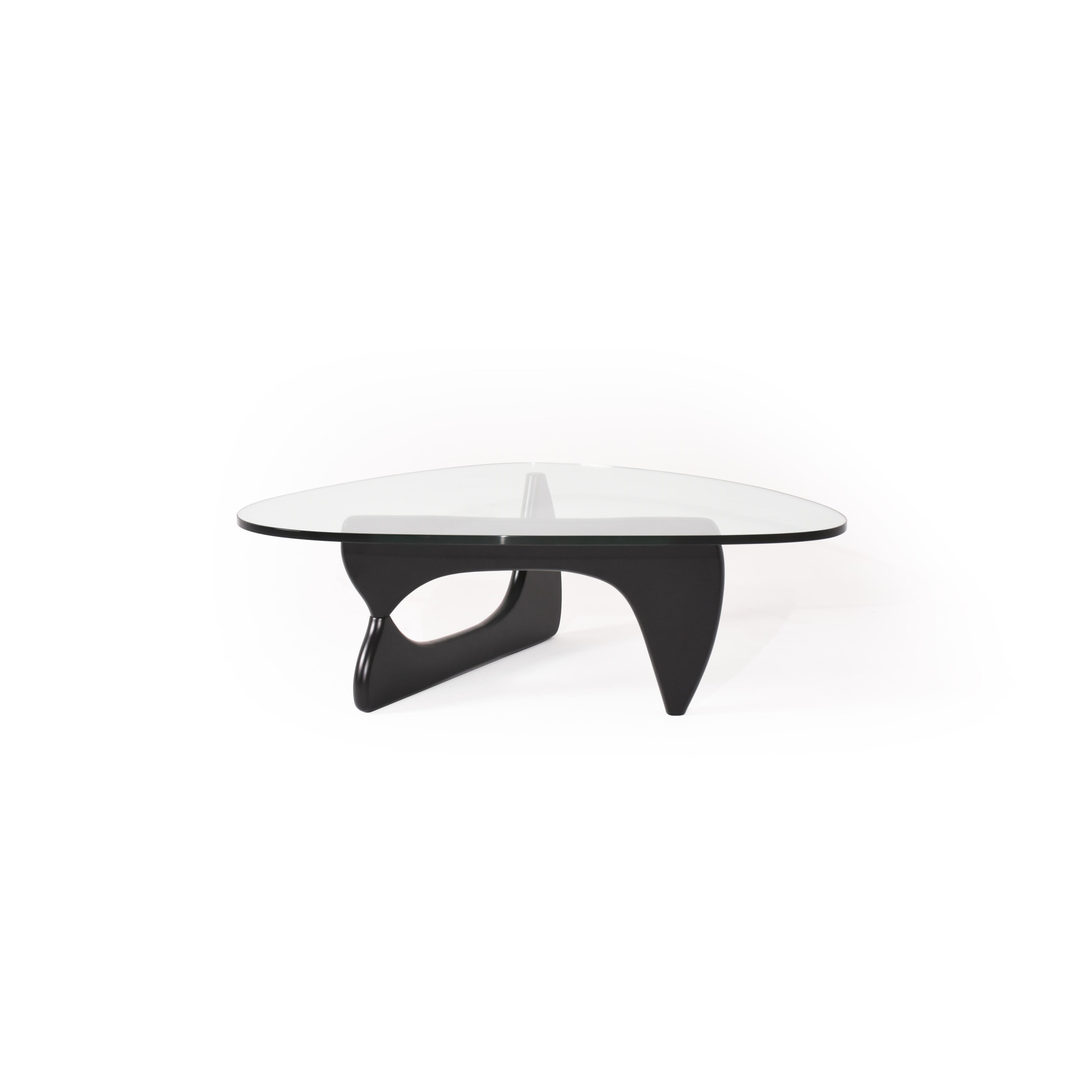 Modern coffee table with a transparent glass top and a black, sculpted base featuring two curved legs and a central support. Designed for placing items on a surface, it has no visible handles, drawers, or upholstery. Category: furniture/coffee-tables