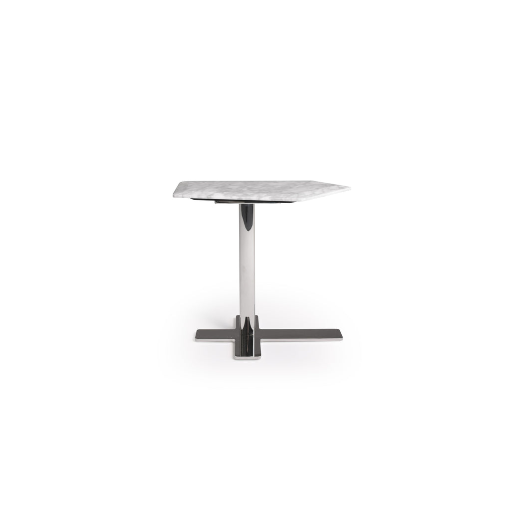 A rectangular table with a white marble top and a polished chrome pedestal base supported by a cross-shaped foot. The table has no visible drawers, doors, or cushions. Intended for dining or display use. Category: furniture > tables > dining tables