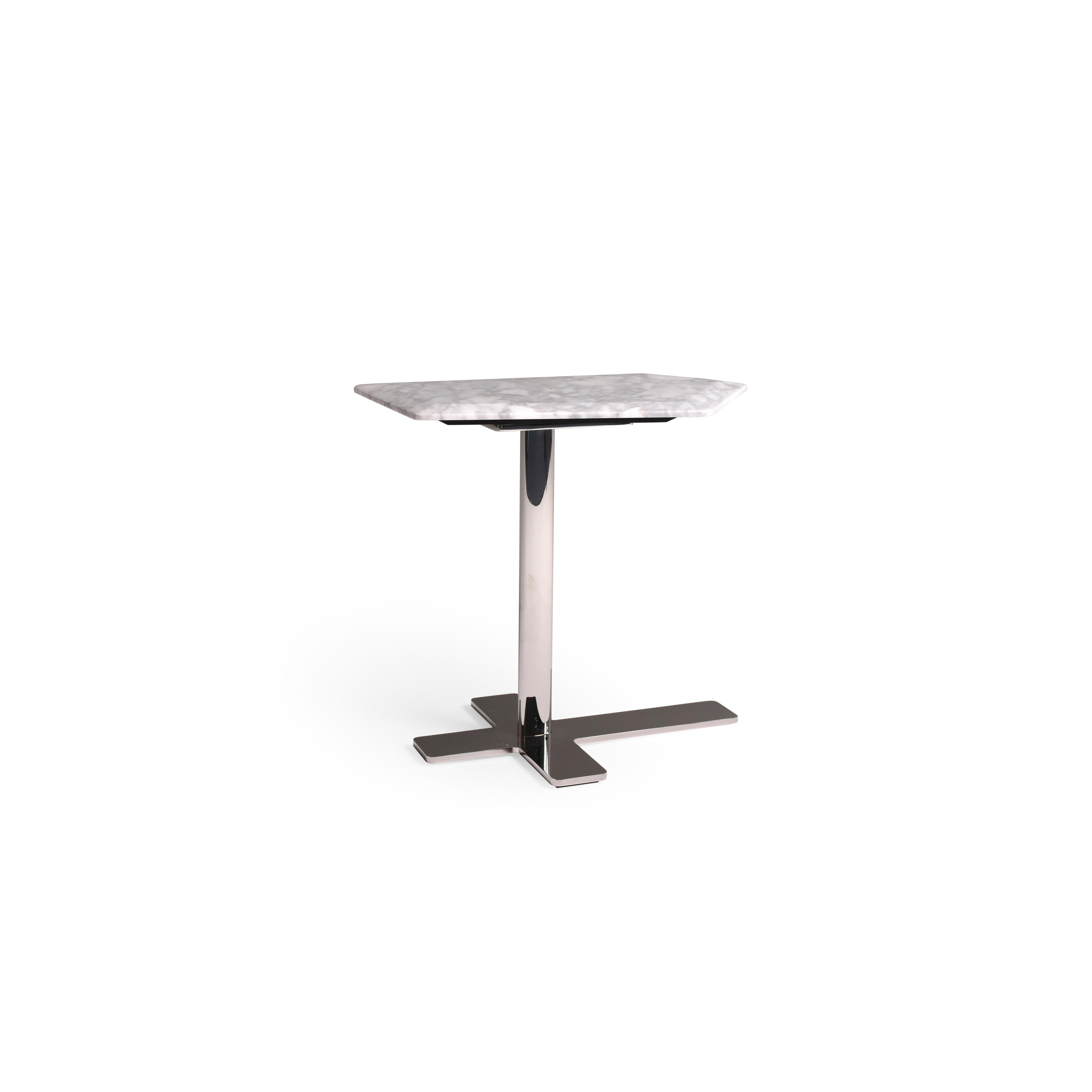 A rectangular table with a white marble top and a polished chrome pedestal base supported by a cross-shaped foot. The table has no visible drawers, doors, or cushions. Intended for dining or display use. Category: furniture > tables > dining tables