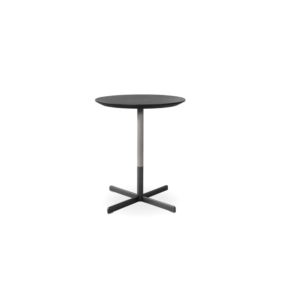 Round table with white top and dark metal base, featuring a central column and X-shaped cross legs. Minimalist design with smooth surfaces and no visible upholstery or handles. Intended for dining or workspaces. Category: furniture > tables > round tables