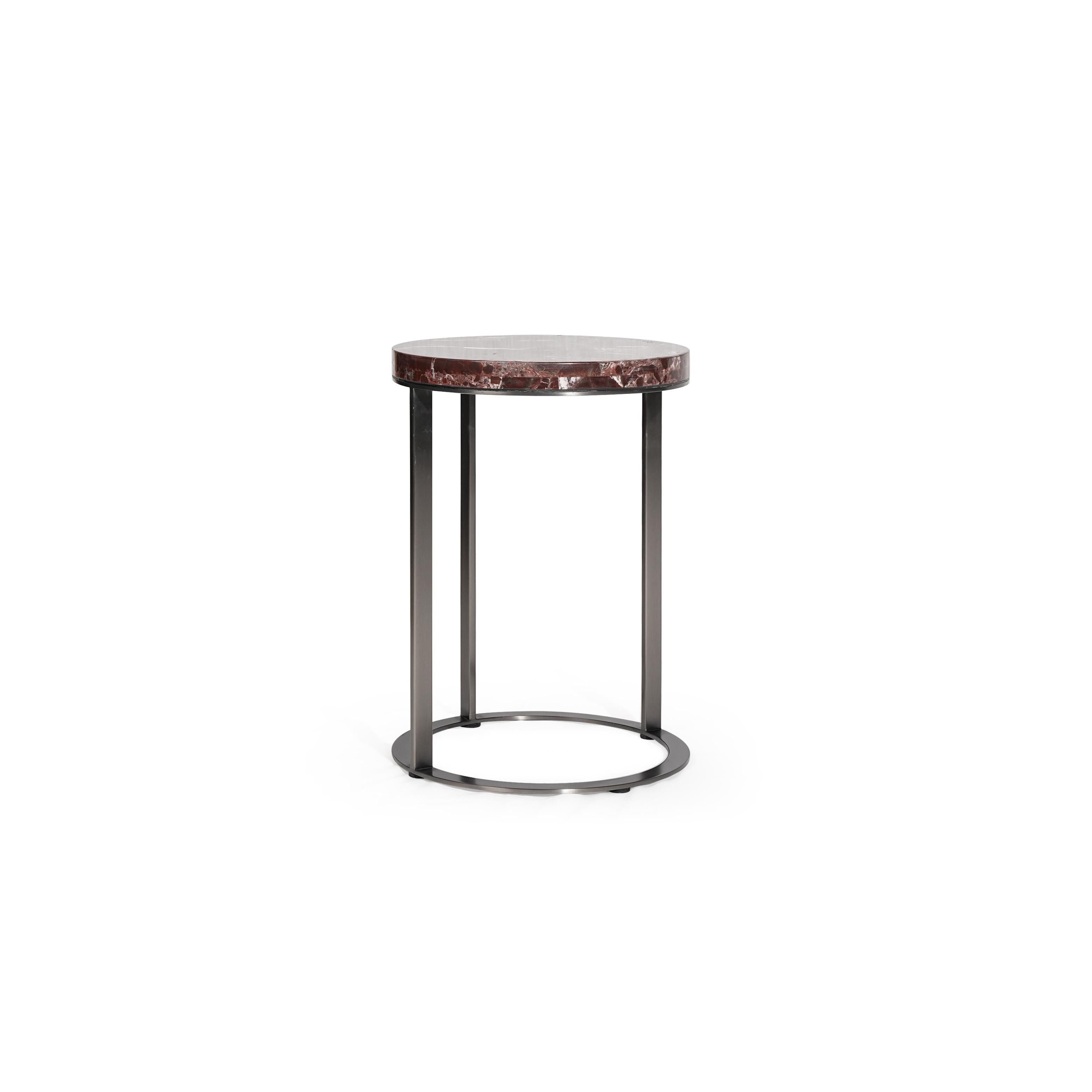 Round side table with a reddish-brown marble top and dark metal legs forming a circular base. Four vertical metal legs connect to a circular metal ring at the bottom. Intended for placing small items. Category: furniture/side-tables