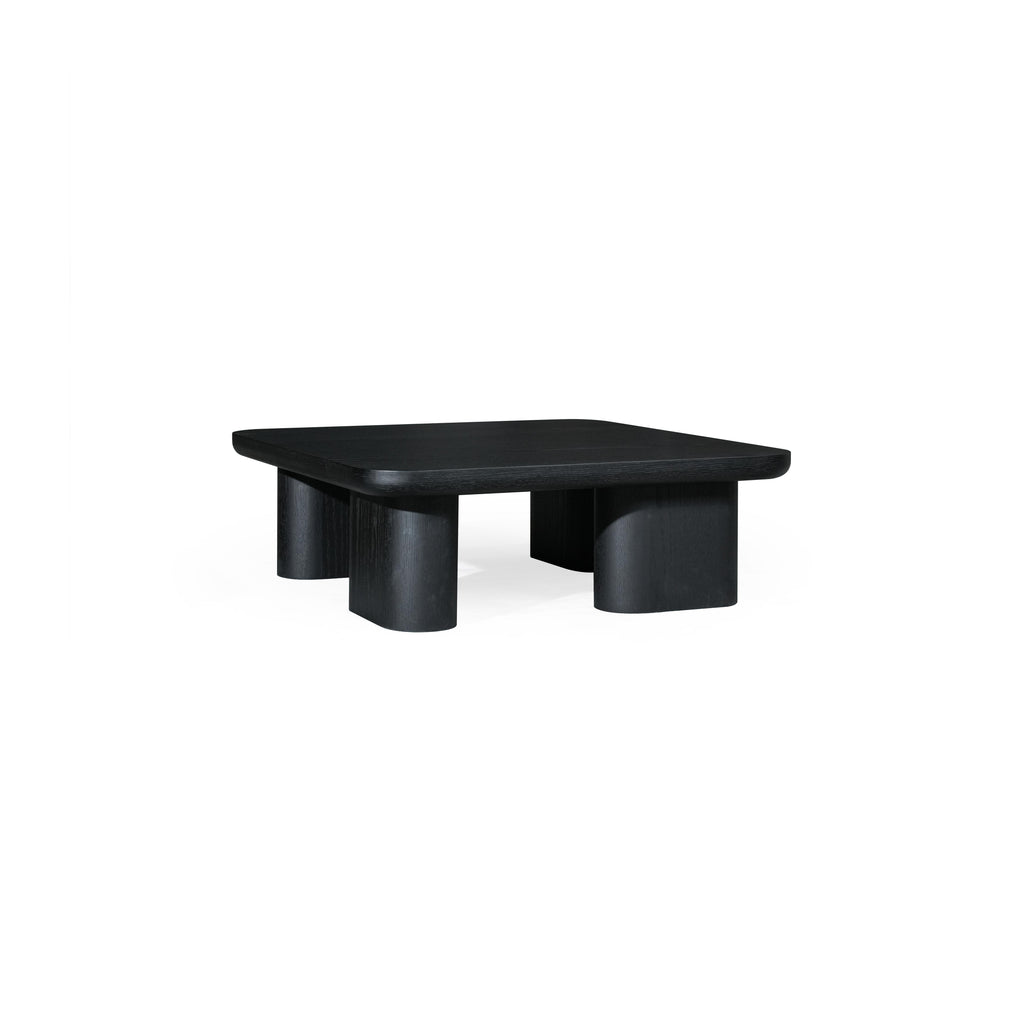 A dark-finished wooden coffee table with a rectangular top and four cylindrical legs, featuring visible wood grain texture and a low-profile, minimalist structure designed for surface placement. Category: Furniture > Coffee Tables