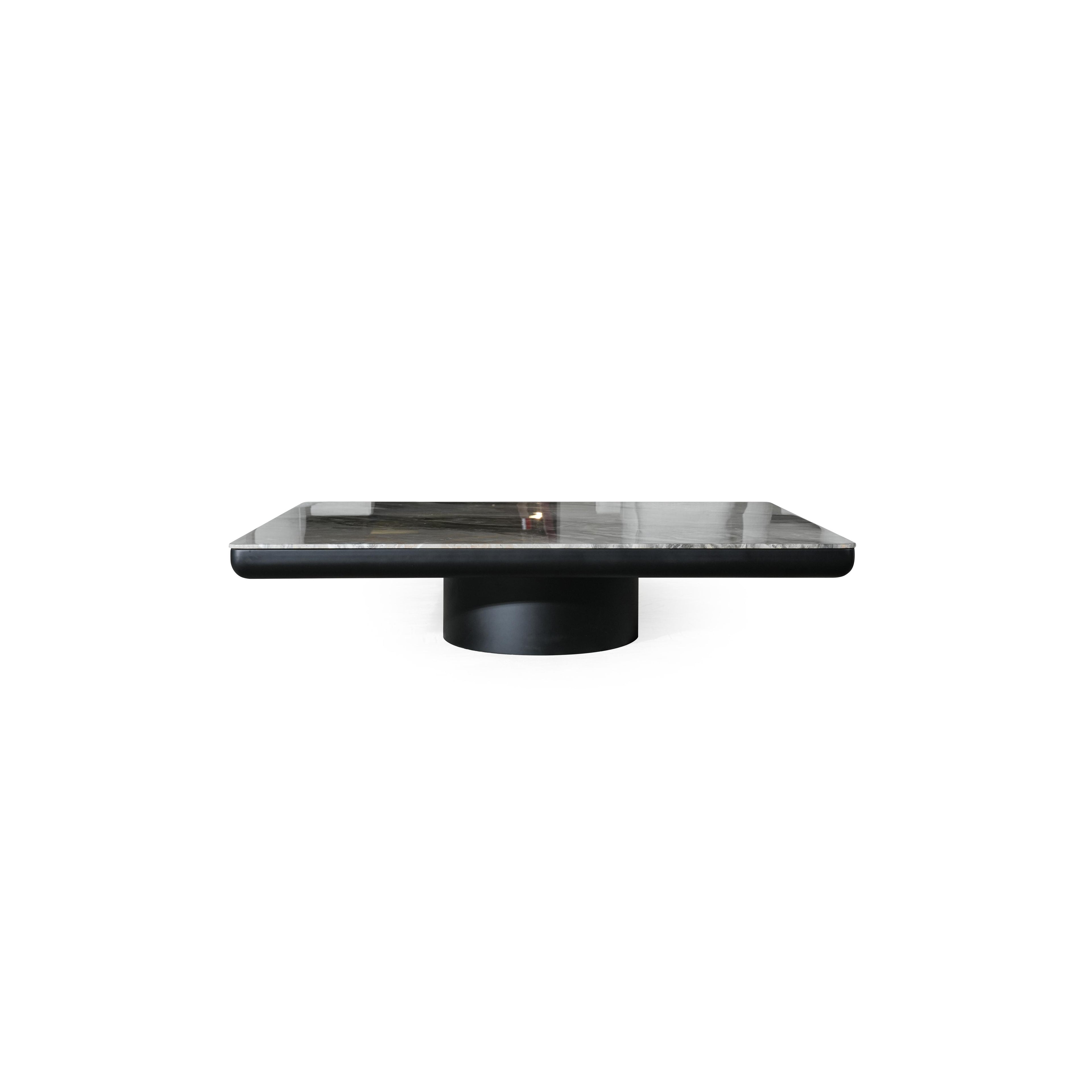 Rectangular coffee table with a black base and a gray marble top. Features a single cylindrical pedestal leg. Marble surface shows natural veining. Designed for placing items on a living room floor. Category: furniture/coffee-tables
