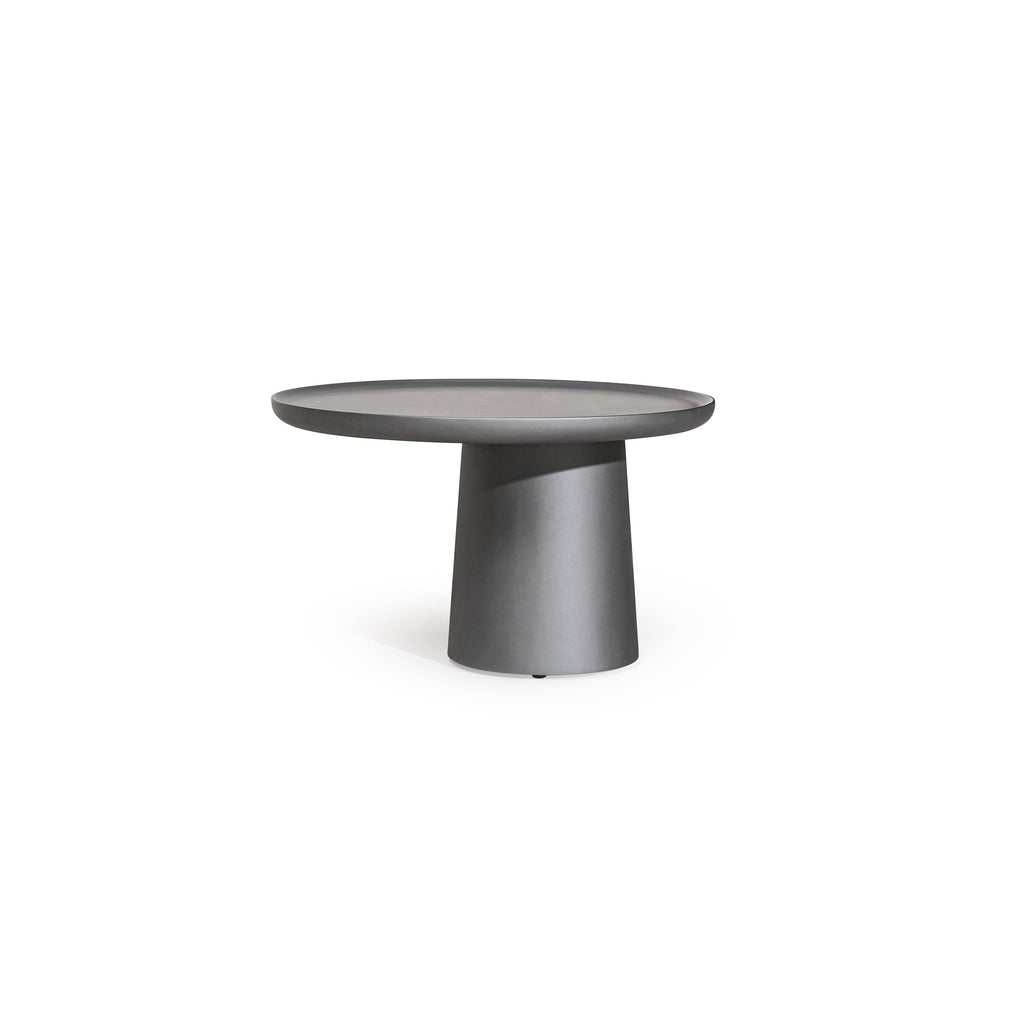 Round side table with a flat, dark gray top and a cylindrical pedestal base. No visible legs, handles, or drawers. Surface appears smooth and uniform. Intended for placing small items. Category: furniture/tables/side-tables