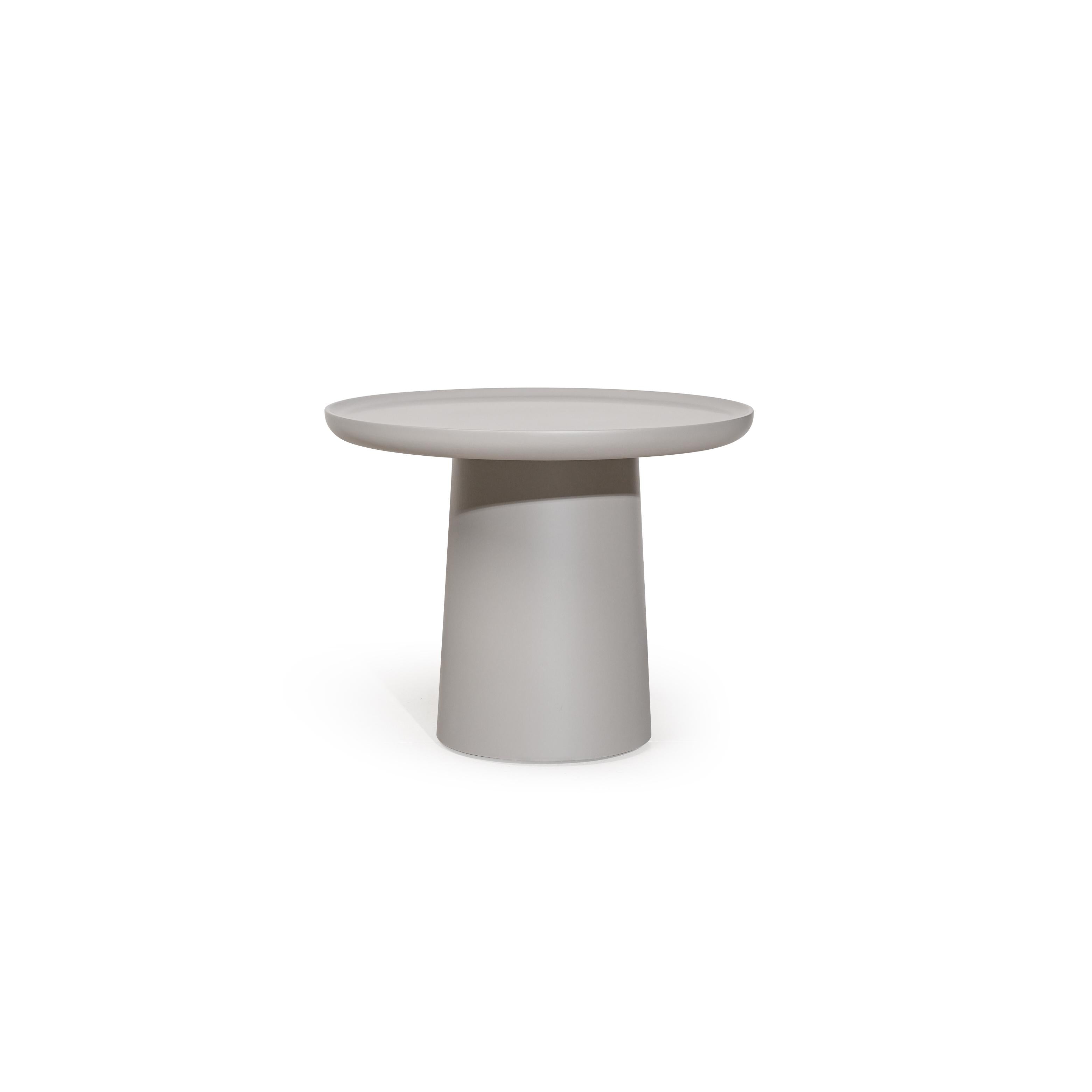 Round side table with a flat, dark gray top and a cylindrical pedestal base. No visible legs, handles, or drawers. Surface appears smooth and uniform. Intended for placing small items. Category: furniture/tables/side-tables