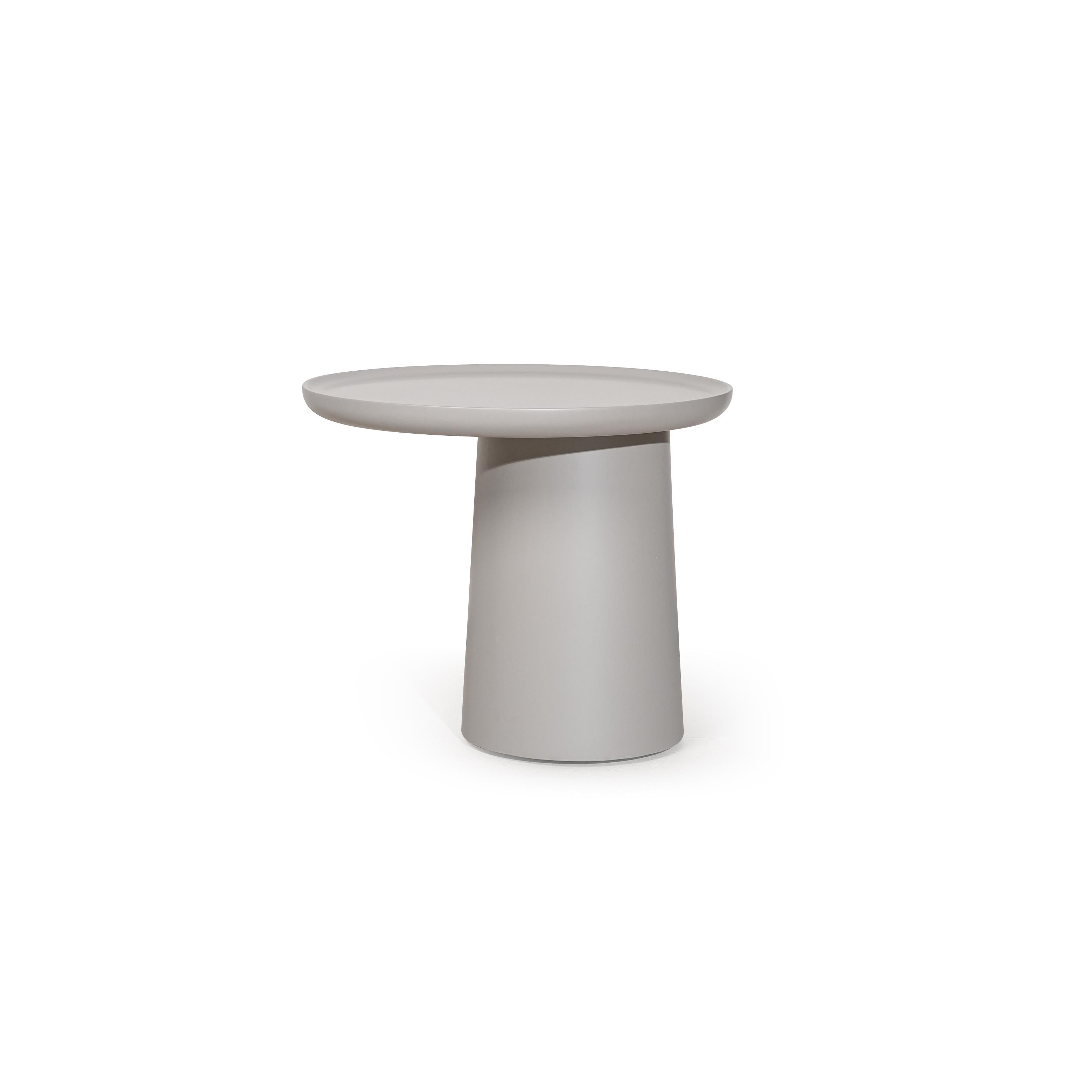 Round side table with a flat, dark gray top and a cylindrical pedestal base. No visible legs, handles, or drawers. Surface appears smooth and uniform. Intended for placing small items. Category: furniture/tables/side-tables