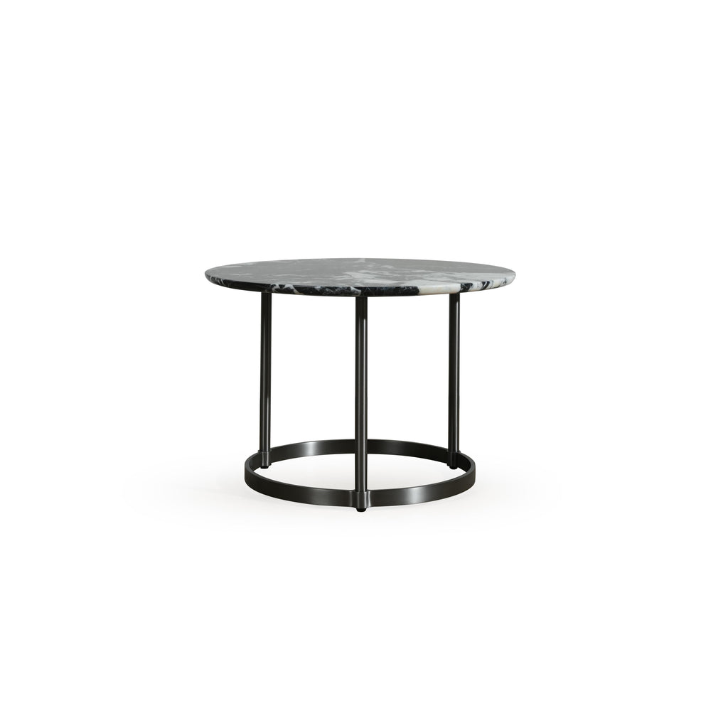 Round side table with black metal legs and circular base, topped with dark gray and white veined marble. Three vertical supports connect to a ring base. Designed for placing items like books or drinks. Category: furniture/tables/side-tables