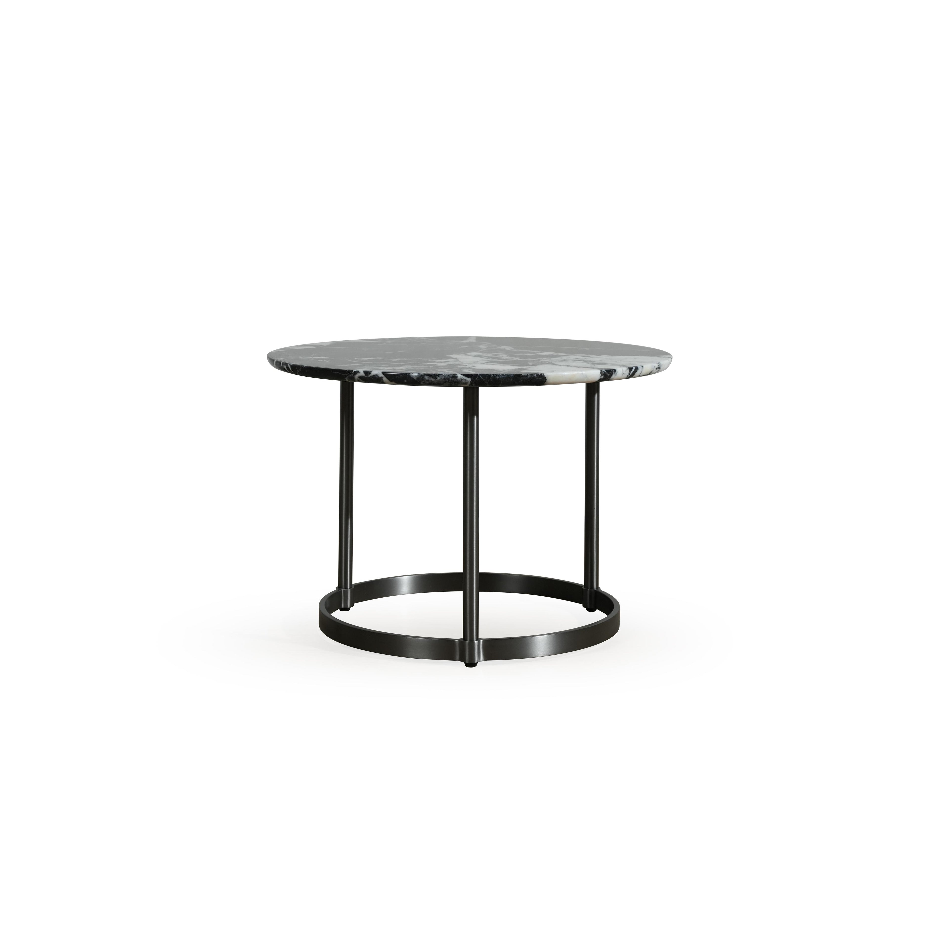 Round side table with black metal legs and circular base, topped with dark gray and white veined marble. Three vertical supports connect to a ring base. Designed for placing items like books or drinks. Category: furniture/tables/side-tables