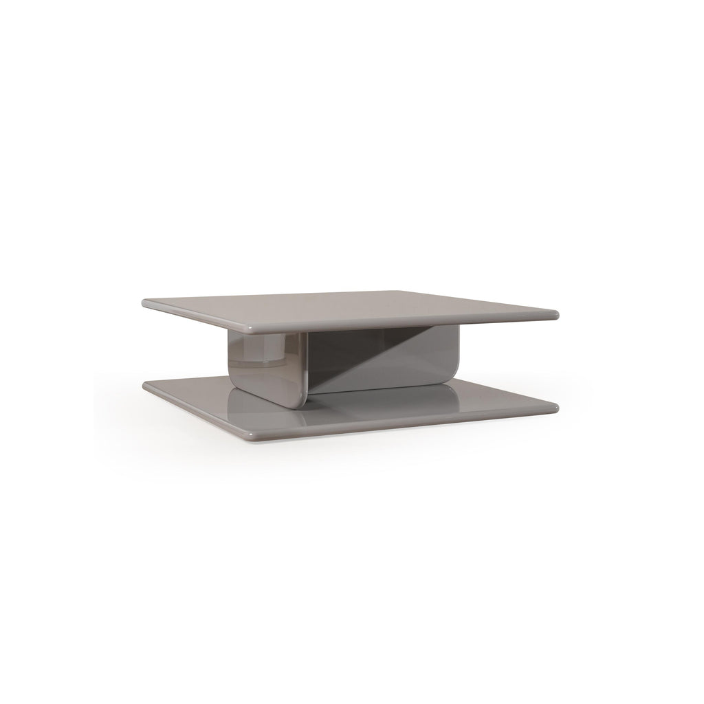 Modern square coffee table with two-tiered design, featuring a glossy gray finish on both top and base surfaces. It has a central support structure connecting the tiers. Intended for placing items on a living room floor. Category: furniture/coffee-tables