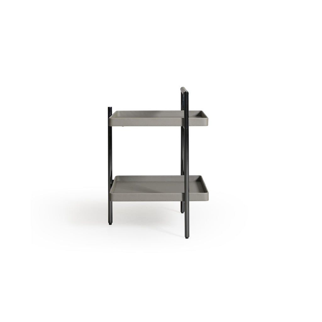 Two-tiered serving cart with matte gray trays and black metal legs and frame. Each tray has visible stitching along edges. Top tray includes a handle. Designed for carrying or displaying items. Category: Furniture > Tables > Serving Tables