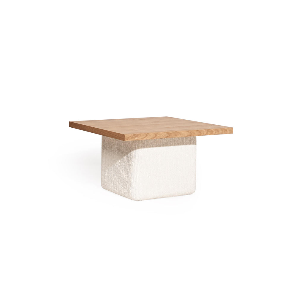 Square-top table with dark wood surface and textured off-white base, featuring a distinct fabric-wrapped pedestal structure, designed for surface placement or as a low seating option, marked with a small tag on the side. Category: Furniture > Tables > Coffee Tables