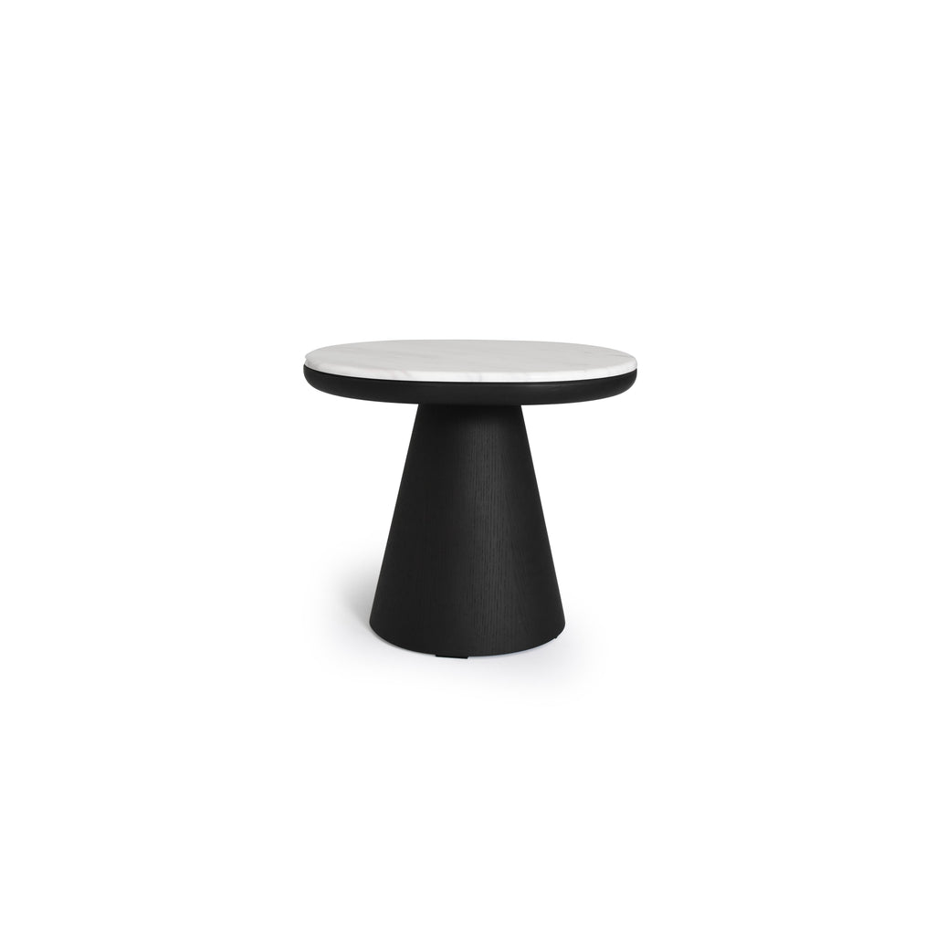 Round side table with white marble top and black wood-grain pedestal base. Features a smooth, circular tabletop supported by a tapered, conical leg. Intended for placing items like books or drinks. Category: furniture/tables/side-tables