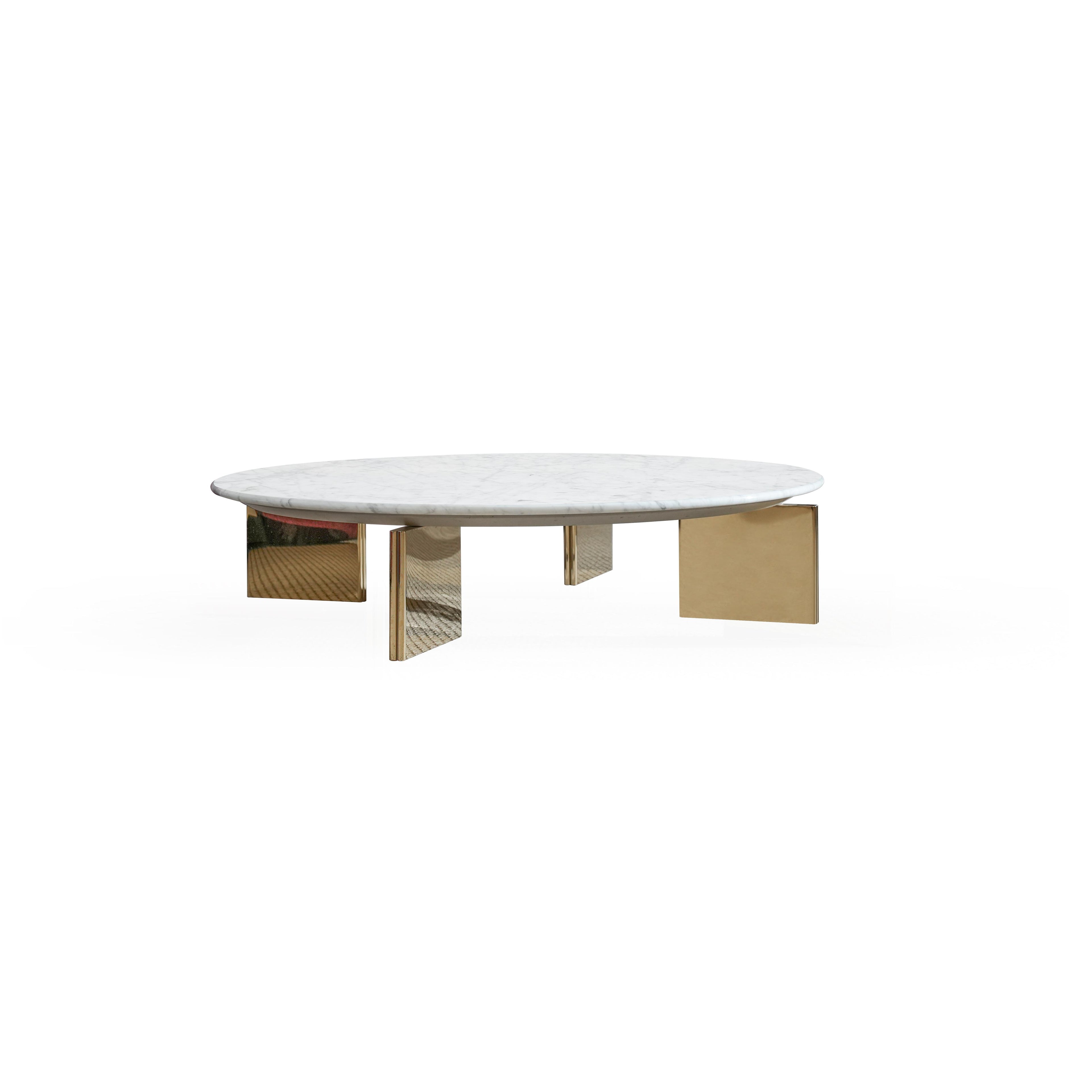 Round coffee table with white marble top and gold-toned metal legs; four rectangular legs support the surface; minimalist design for placing items; smooth marble texture and reflective metal finish; intended for use as a center table in living spaces; Category: Furniture > Coffee Tables