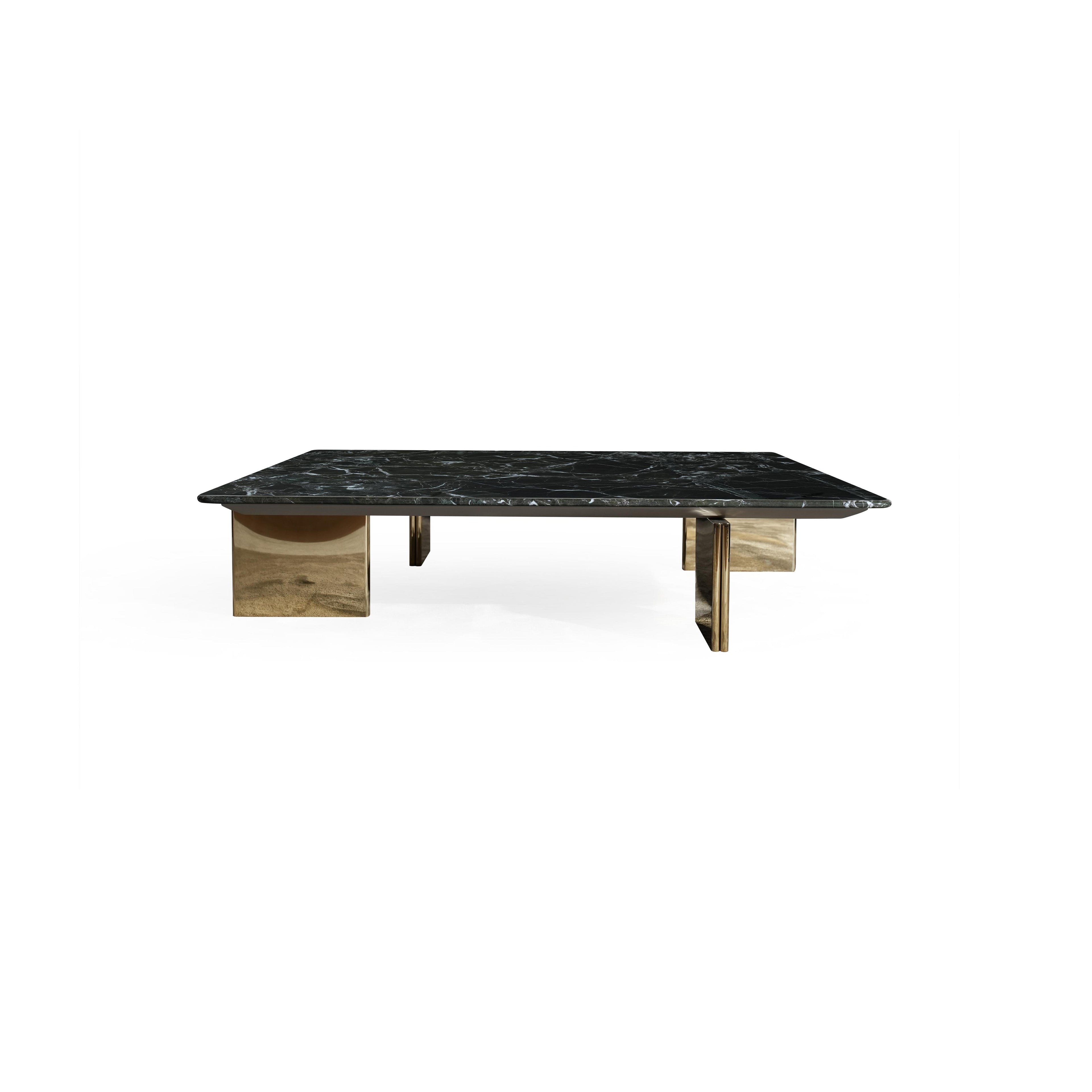 Rectangular coffee table with dark marble top and four polished brass legs; minimalist design with flat, square supports; intended for placing drinks or small items; Category: Furniture > Coffee Tables