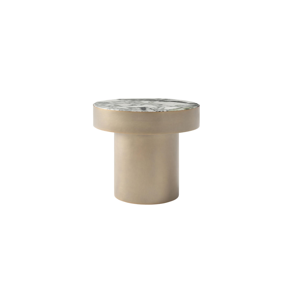Round side table with a marble top and cylindrical metal base. Features a smooth, metallic finish and a flat, circular tabletop. Intended for placing items like books or drinks. Category: furniture/tables/side-tables