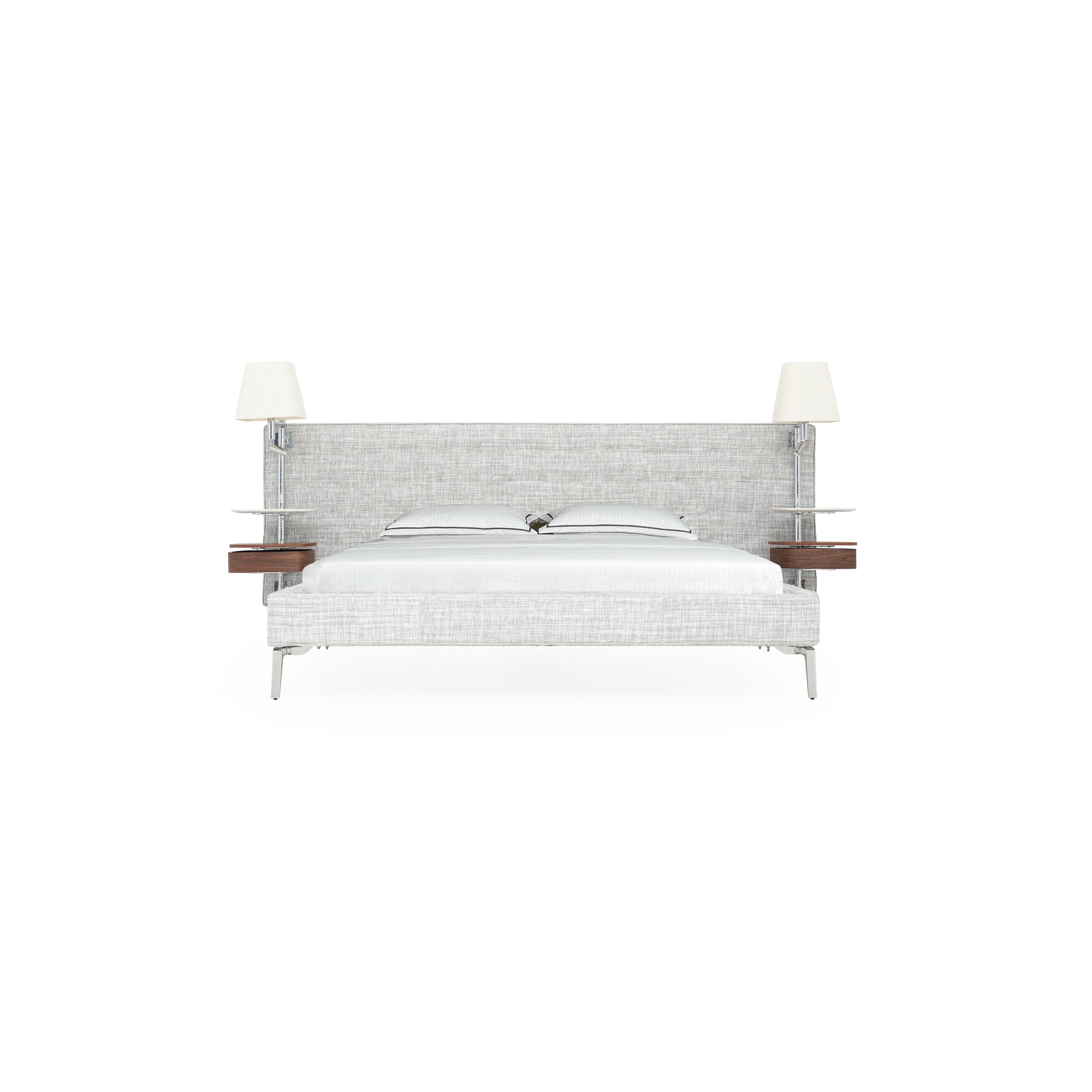 Modern upholstered bed with light gray textured fabric, metal legs, and integrated headboard with two wall-mounted lamps and wooden shelves. Features two pillows and white bedding. Intended for sleeping. Category: furniture > beds > upholstered beds