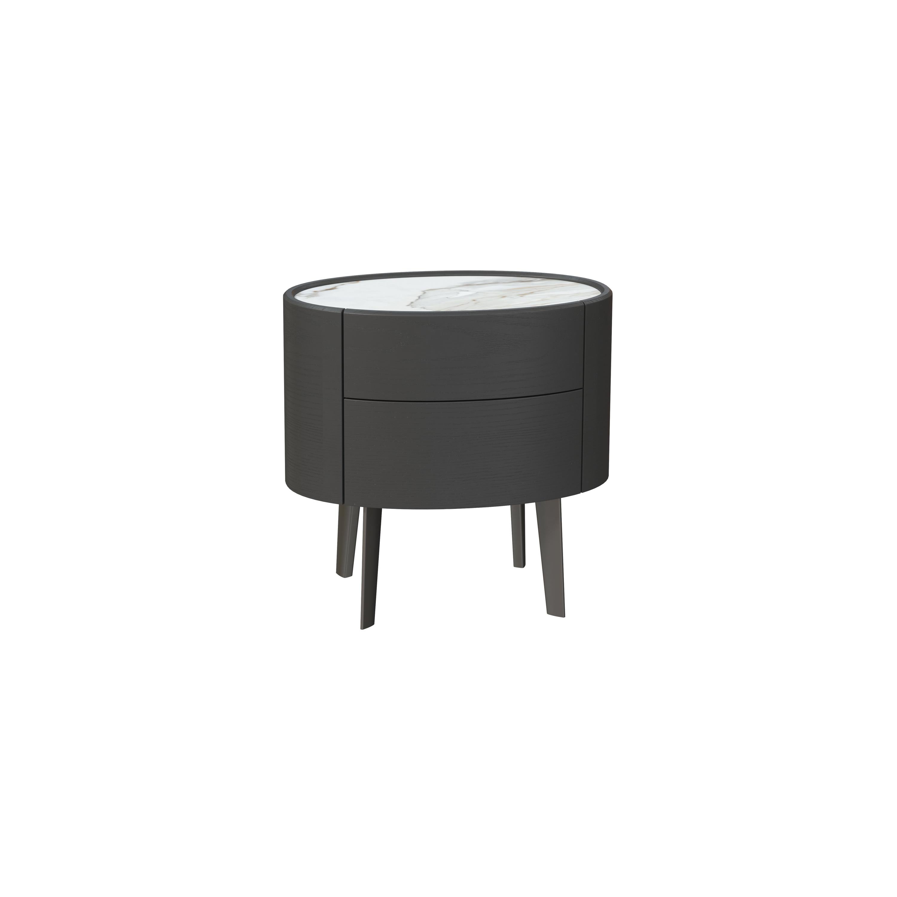 Round nightstand with two drawers, dark gray wood-grain finish, white marble top, four tapered legs, no visible handles or fasteners, designed for bedside storage, Category: Furniture > Nightstands