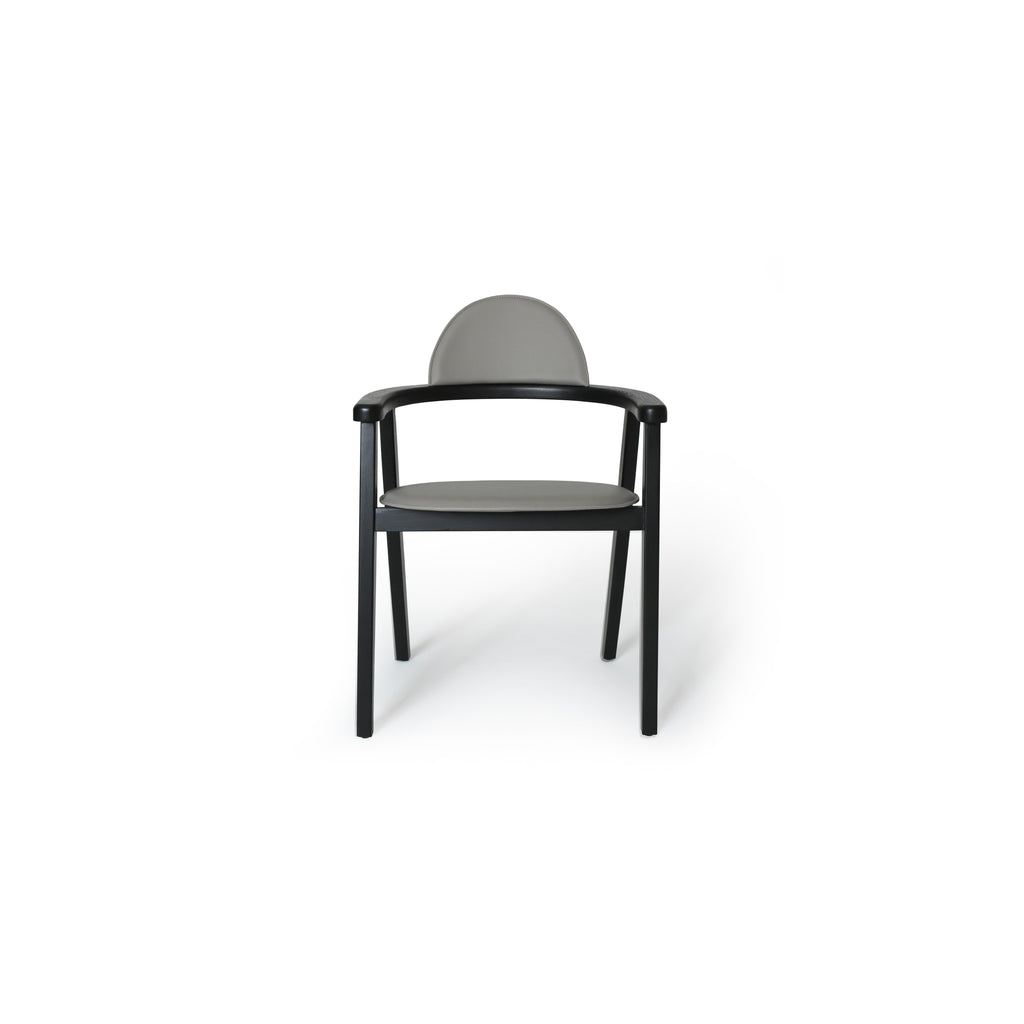 Armchair with black frame and gray upholstered seat and backrest; four straight legs, curved armrests, and a rounded backrest; no visible stitching or fasteners; intended for seating; Category: Furniture > Chairs > Dining Chairs