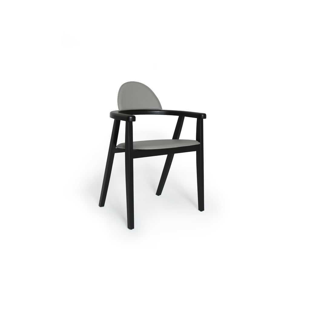 Armchair with black frame and gray upholstered seat and backrest; four straight legs, curved armrests, and a rounded backrest; no visible stitching or fasteners; intended for seating; Category: Furniture > Chairs > Dining Chairs