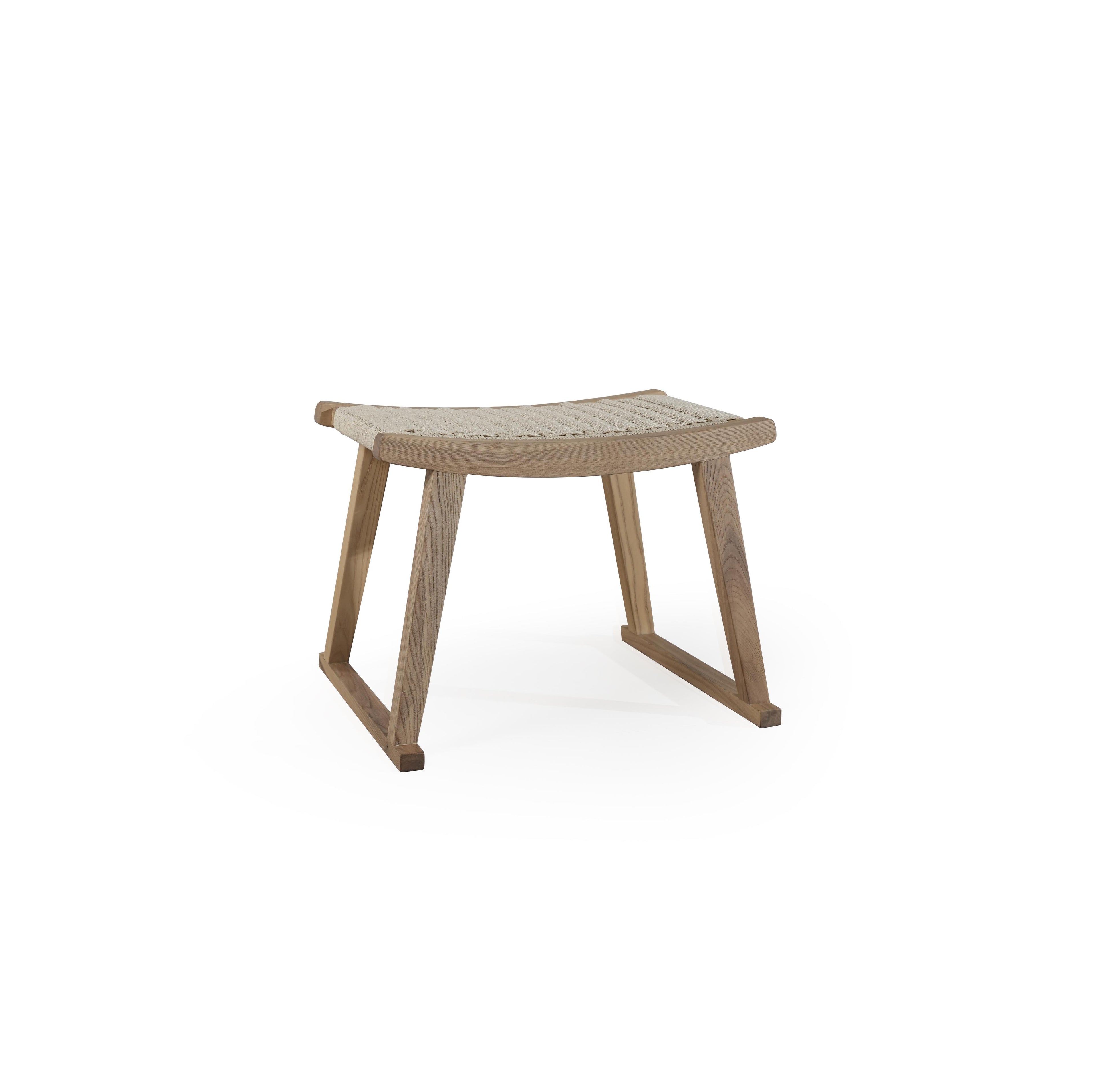 A wooden footstool with a curved, woven seat surface and angled legs forming a stable base. The seat features a light-colored, tightly woven texture. The frame is made of wood with visible grain. Intended for footrest use. Category: Furniture > Stools > Footstools