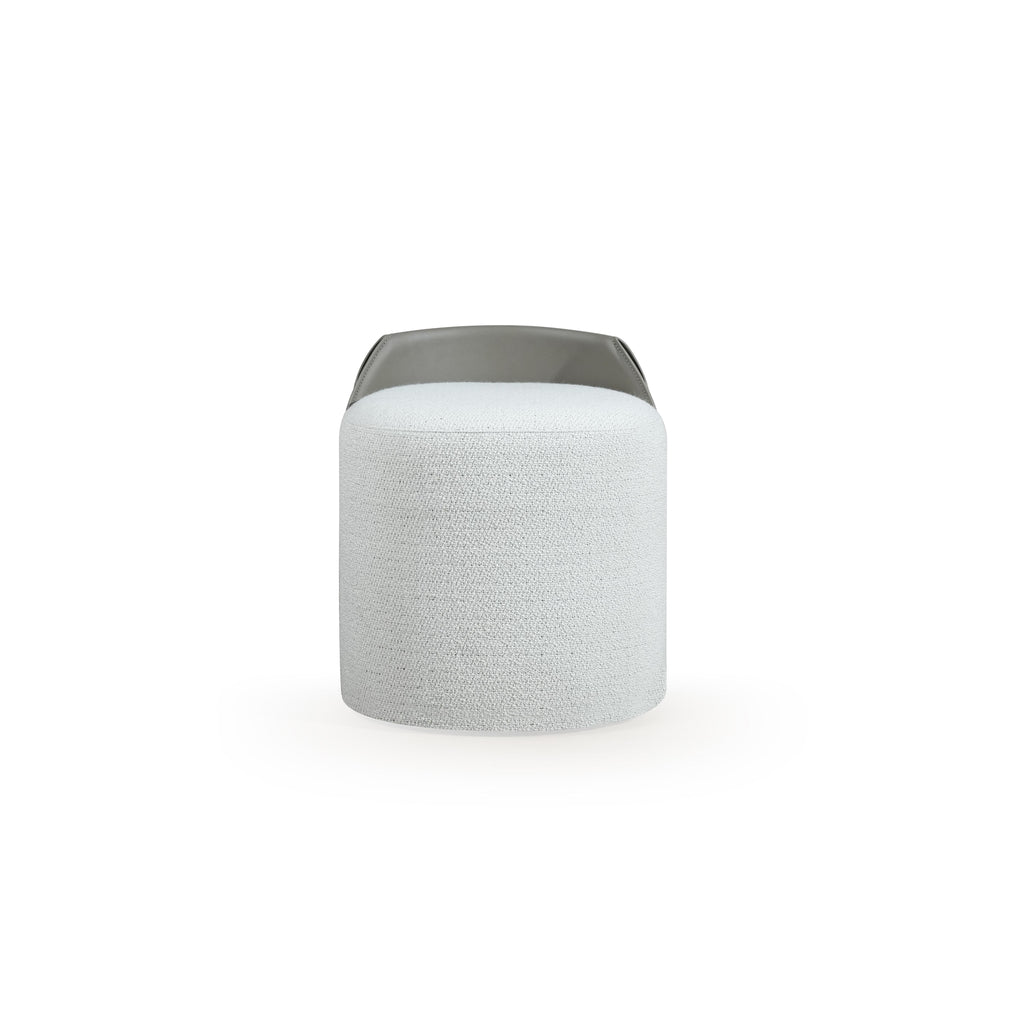 This is a cylindrical upholstered stool with a light gray fabric body and a darker gray leather-like top rim. It has no visible legs or frame, suggesting a seated surface designed for footrest or small seating. The fabric shows a textured weave. Intended for casual seating or as a decorative accent. Category: Furniture > Stools