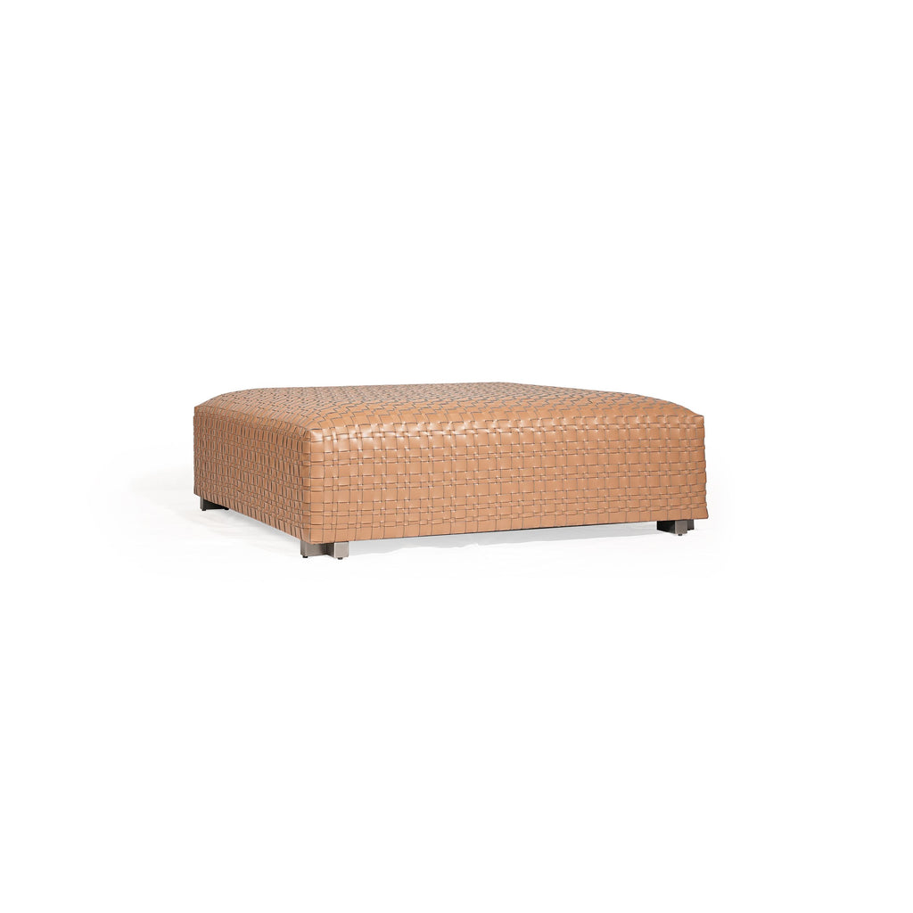 Rectangular ottoman with tan woven leather surface, four short metallic legs, and a uniform grid pattern across its top and sides, designed for seating or as a footrest. Category: Furniture > Seating > Ottomans