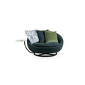 Circular swivel lounge chair with dark green textured fabric upholstery, black metal base with X-shaped support, and integrated side table with light green marble top; features three cushions including one with gray and white pattern and one solid olive green; designed for seated relaxation and casual use. Category: Furniture > Sofas & Sectionals > Lounge Chairs