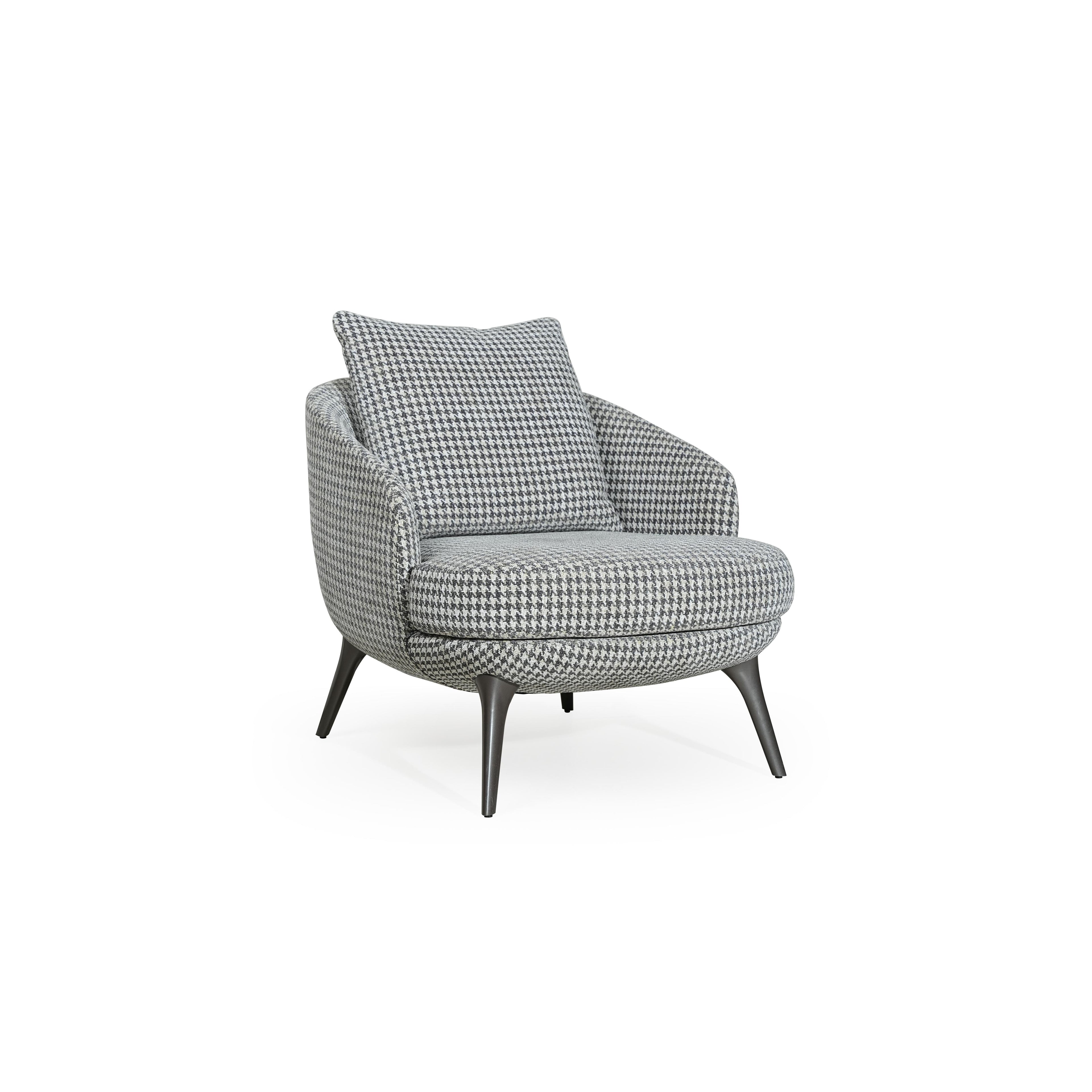 A upholstered armchair with a houndstooth pattern in gray and white, featuring rounded contours, four tapered legs, and a matching back cushion, designed for seated comfort in a living space. Category: Furniture > Chairs > Armchairs