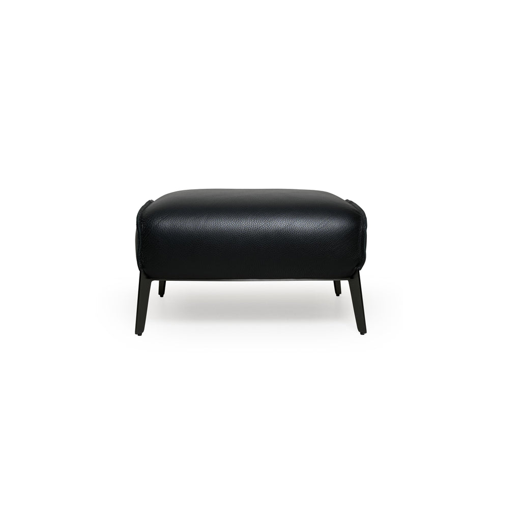 Black leather-like upholstered armchair with curved backrest, padded arms, and a rounded seat supported by four slender metallic legs; designed for seated comfort in living or lounge areas. Category: furniture/armchairs