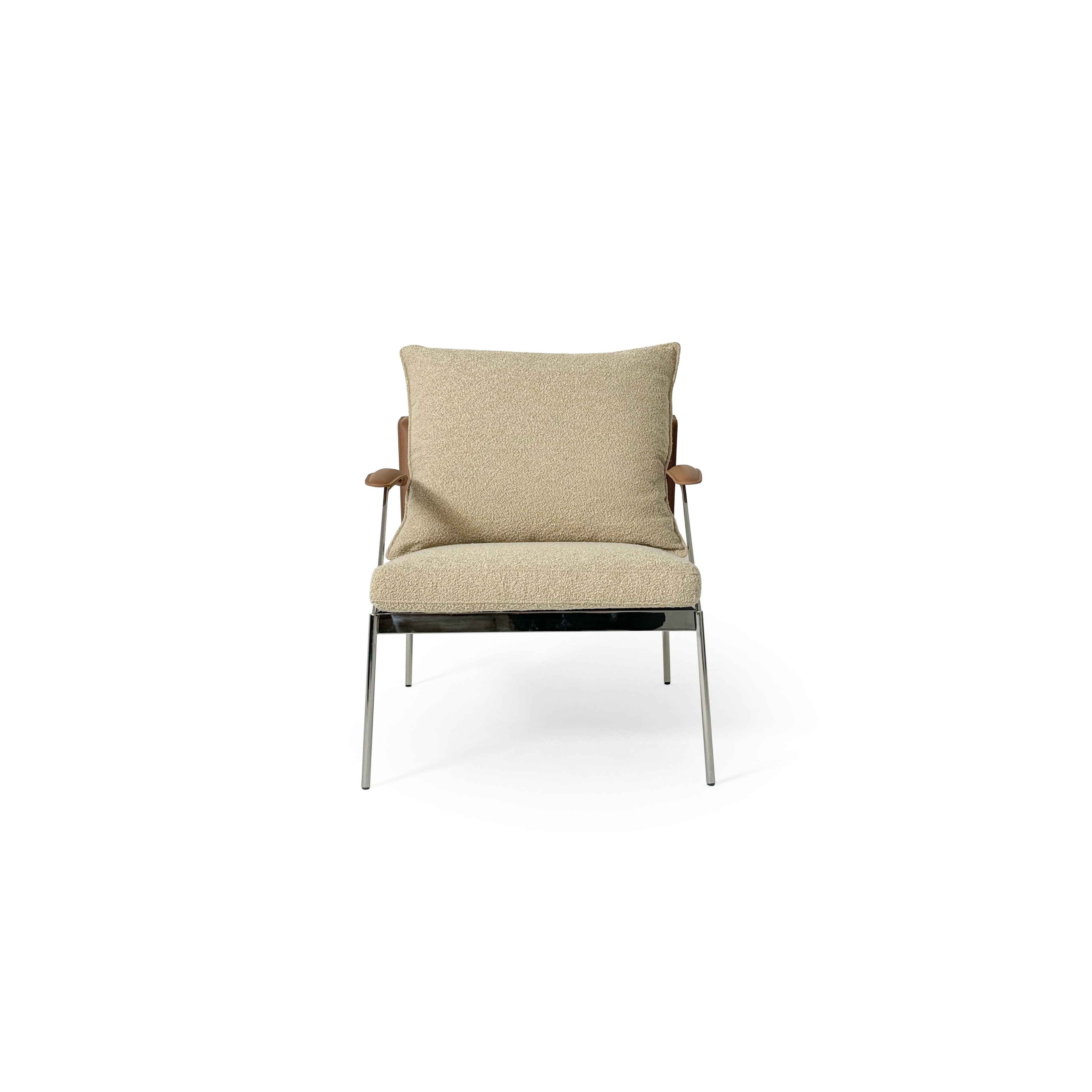 Armchair with beige boucle fabric upholstery, wooden armrests, and chrome metal legs. Features a cushioned seat and backrest, stitched seams, and a sleek, modern silhouette. Designed for seated comfort in living spaces. Category: Furniture > Chairs > Armchairs