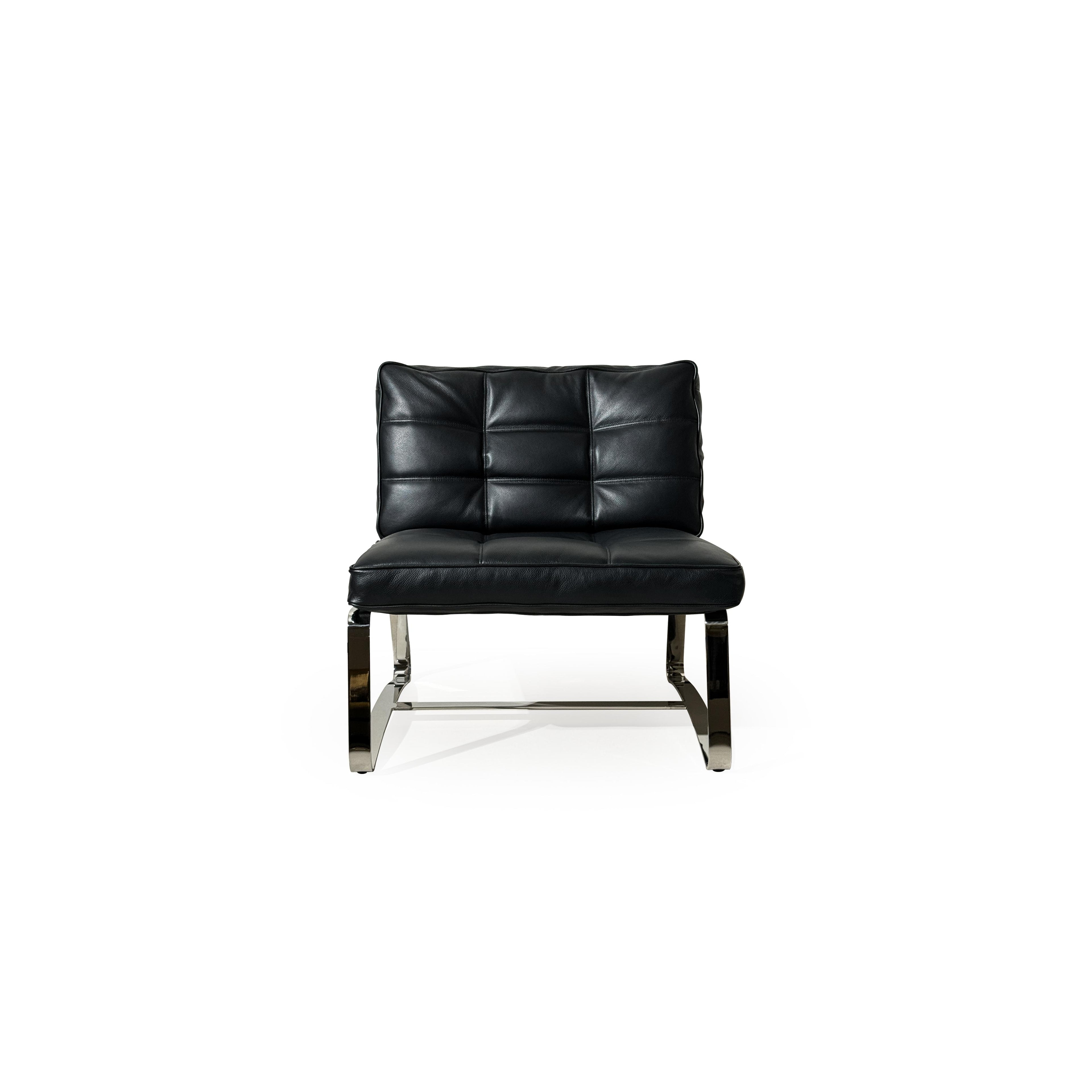 Black leather-like upholstered armless chair with tufted backrest and seat, supported by polished chrome cantilever legs and a horizontal connecting bar; designed for seated comfort in modern interiors. Category: Furniture > Chairs > Armless Chairs