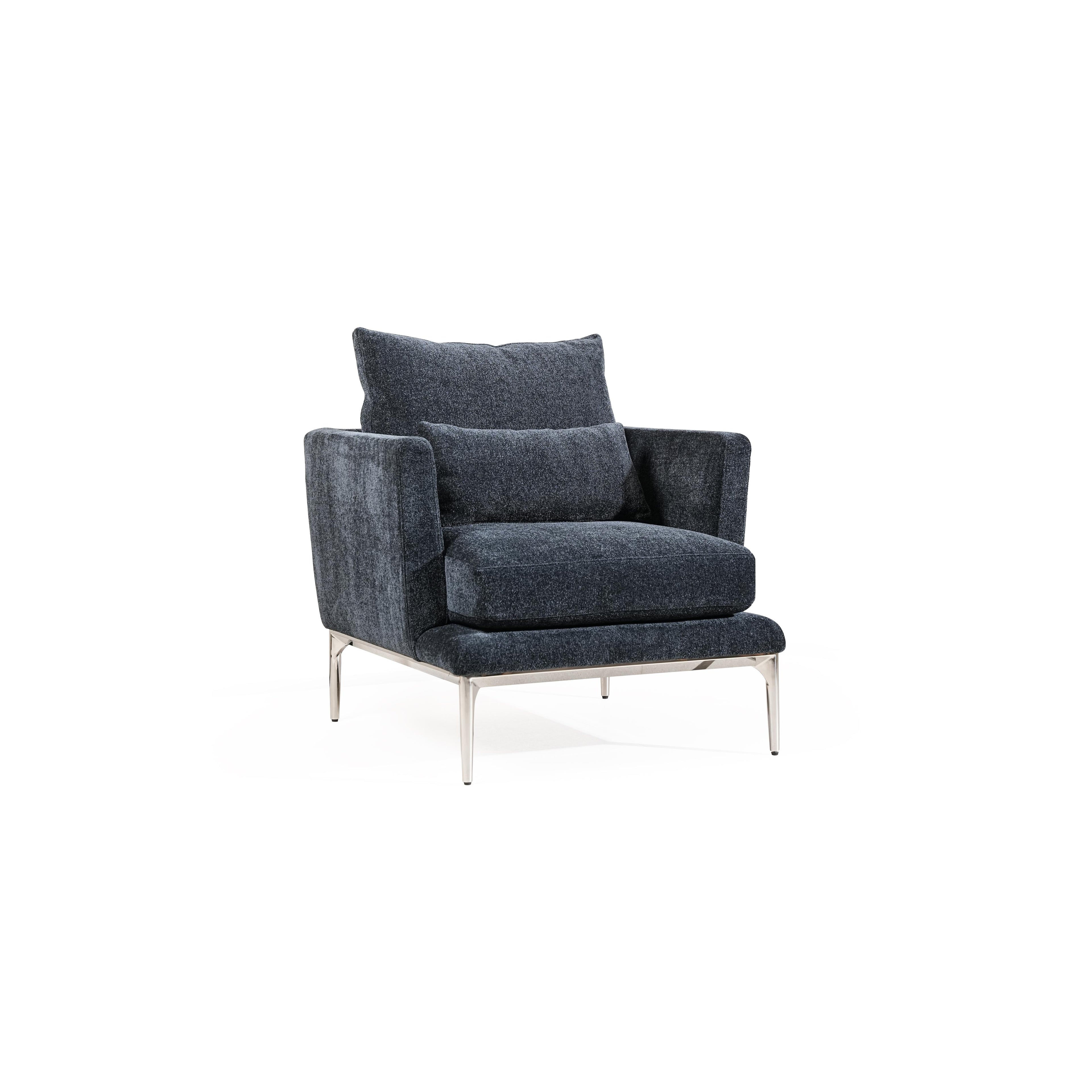 Armchair with dark gray textured fabric upholstery, featuring a rectangular backrest, padded seat, and matching armrests supported by four slender metallic legs. Intended for seated comfort in living spaces. Category: furniture/armchairs