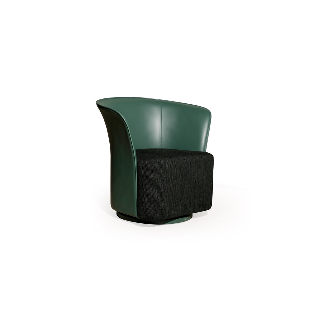 This is a swivel armchair with a curved backrest and a square seat cushion. The backrest and sides are upholstered in smooth, dark green leather-like material, while the seat is covered in a textured black fabric. It rests on a circular base. Intended for seating, it features a continuous, rounded form with no visible legs or structural hardware. Category: Furniture > Chairs > Swivel Chairs