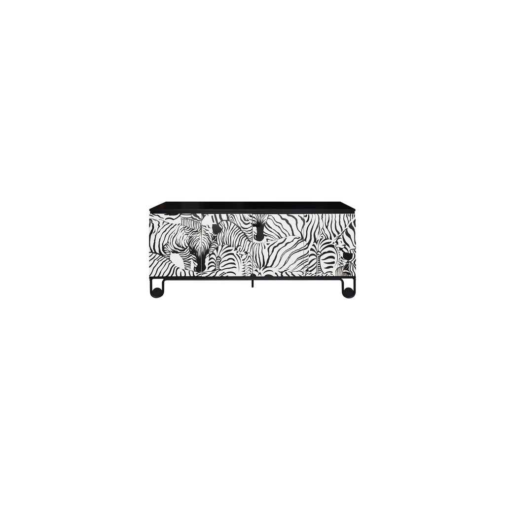 A low-profile sideboard with three doors featuring bold black and white zebra stripe patterns, supported by four rounded black legs and a flat black top surface; intended for storage and display in living or dining areas. Category: furniture > sideboards