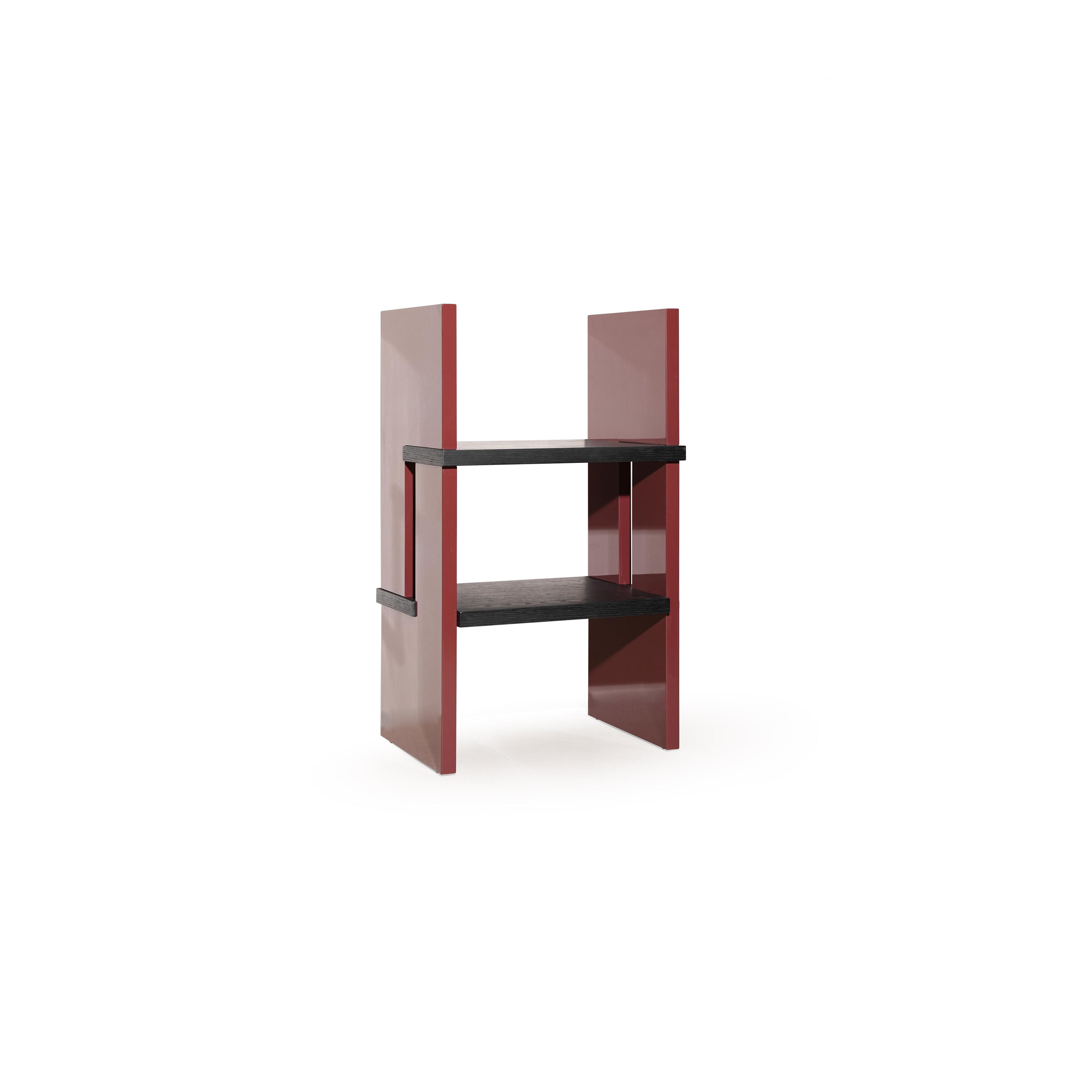 Two-tiered shelf unit with dark gray wooden shelves and glossy red vertical supports; rectangular form with no back or arms; intended for displaying items; Category: Furniture > Shelves > Display Shelves