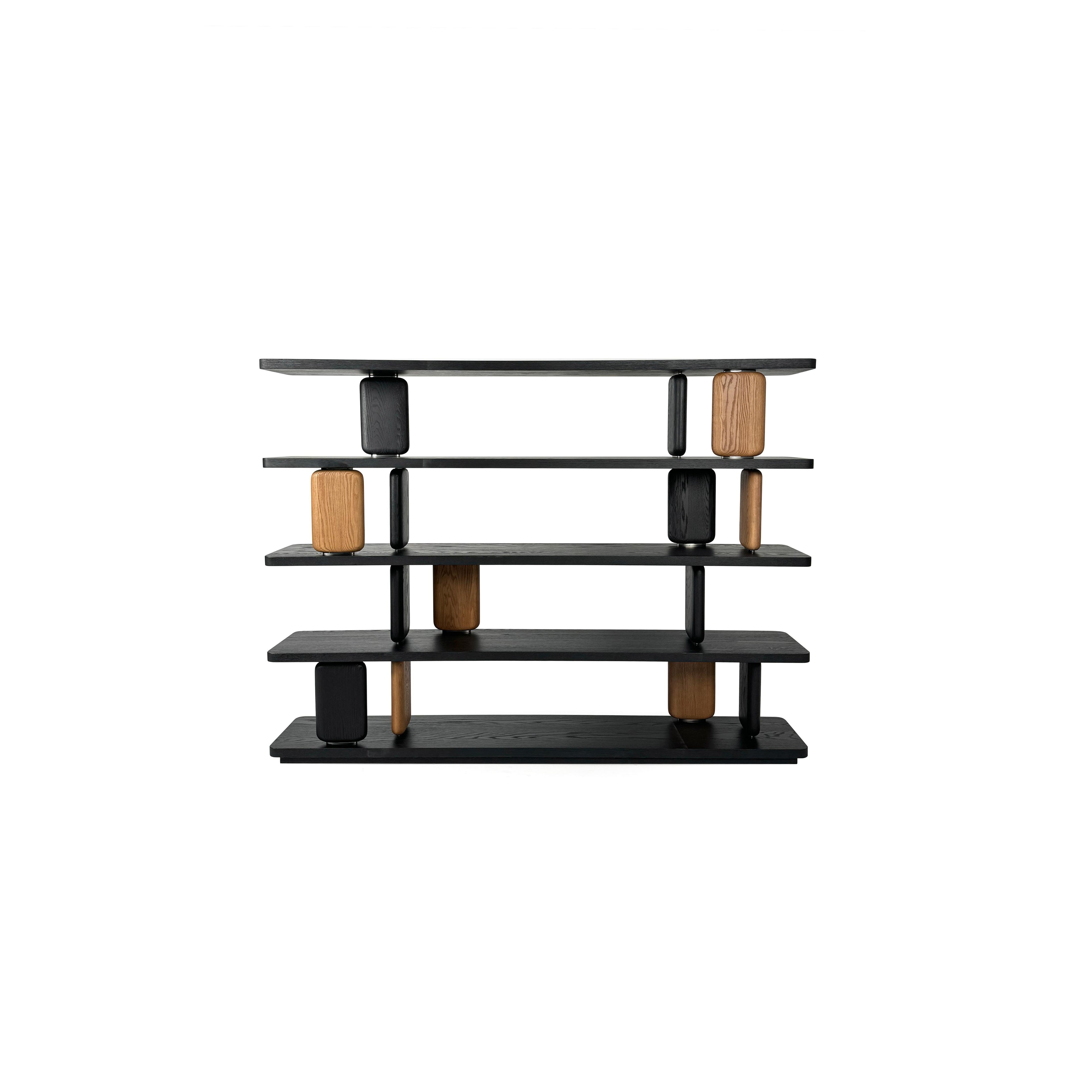 Modern open shelving unit with five horizontal shelves supported by alternating black and light wood-toned rectangular pillars. Features visible wood grain on some pillars and matte black finish on others. Designed for displaying items or storing belongings. Category: furniture/shelving/indoor-shelving