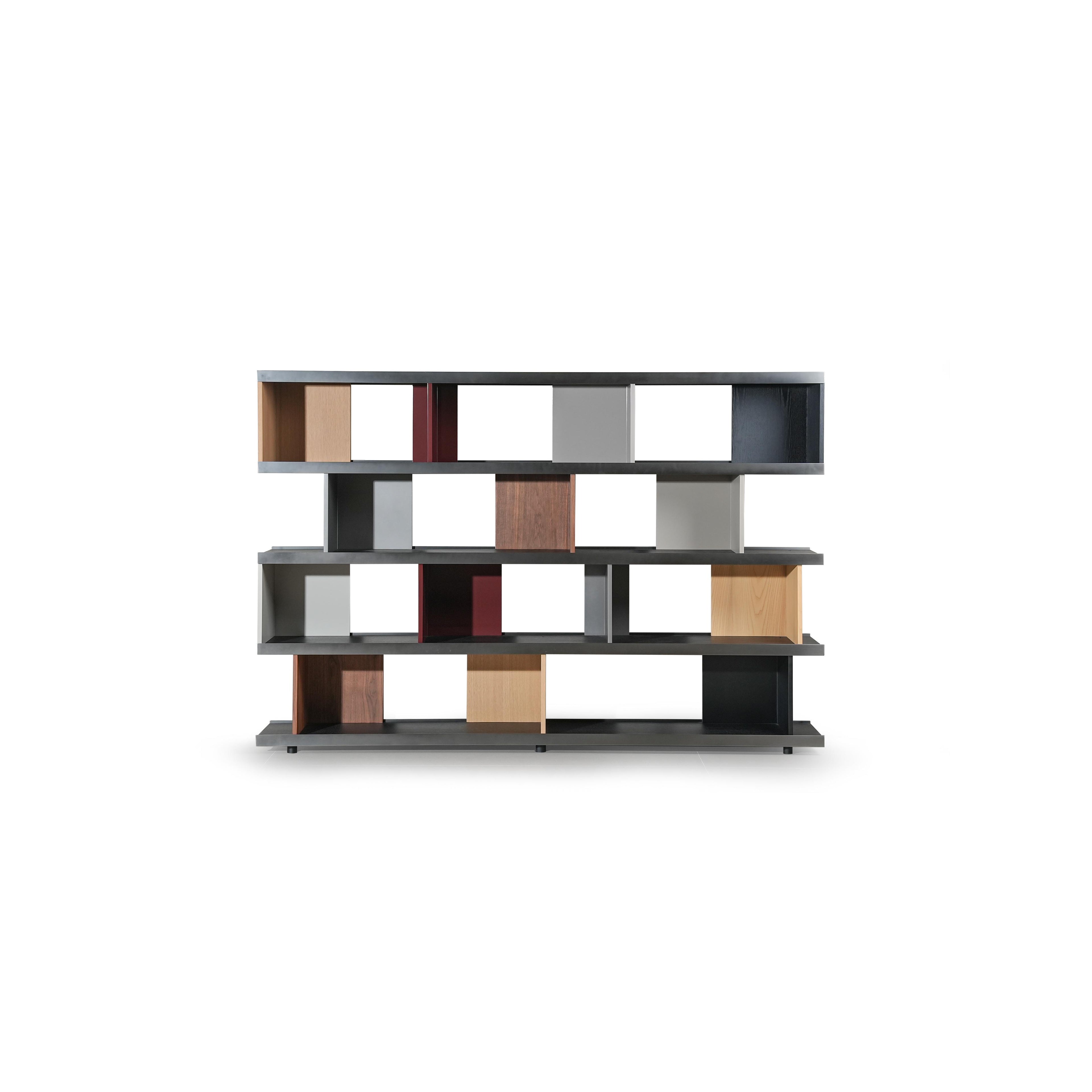 Modern modular bookshelf with three horizontal tiers, featuring mixed wood tones and matte gray metal frames. Each tier holds rectangular compartments in varying colors and wood grains. Designed for displaying books or decorative items. Category: Furniture > Bookshelves > Modern Bookshelves