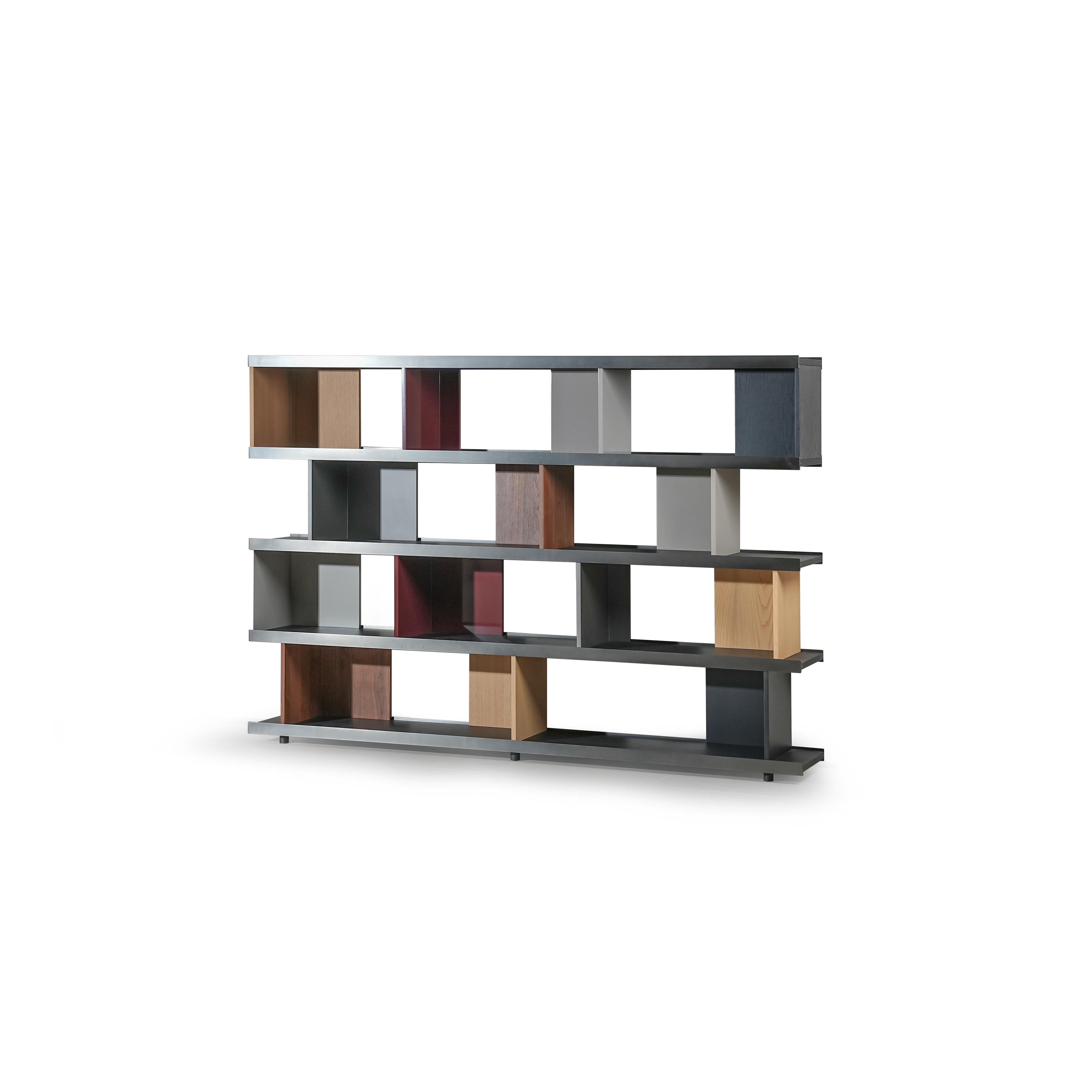 Modern modular bookshelf with three horizontal tiers, featuring mixed wood tones and matte gray metal frames. Each tier holds rectangular compartments in varying colors and wood grains. Designed for displaying books or decorative items. Category: Furniture > Bookshelves > Modern Bookshelves