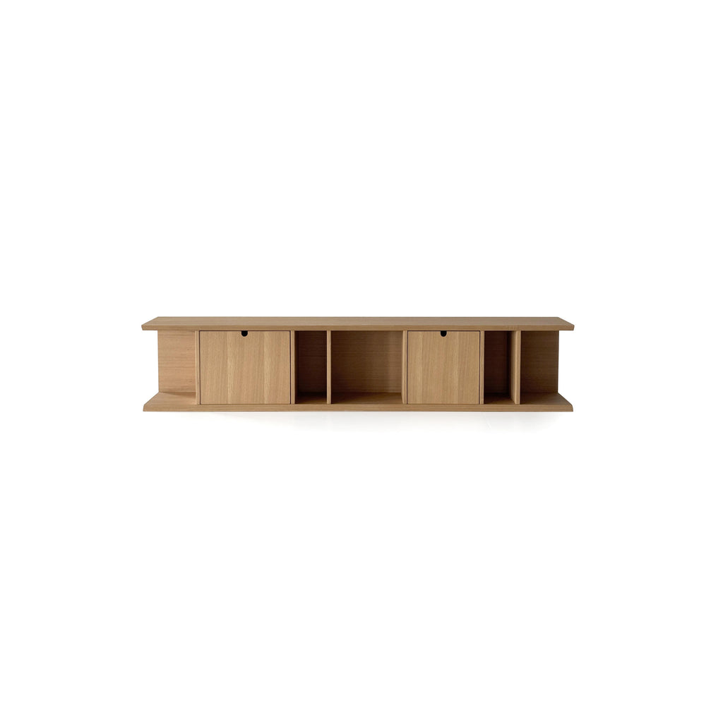 This is a long, low-profile wooden storage unit with two drawers and two open compartments. It features flat-panel doors with black pull handles, a flat top surface, and a lower shelf. Made of light-toned wood with visible grain, it’s designed for organizing items. Category: furniture > storage > shelves and cabinets