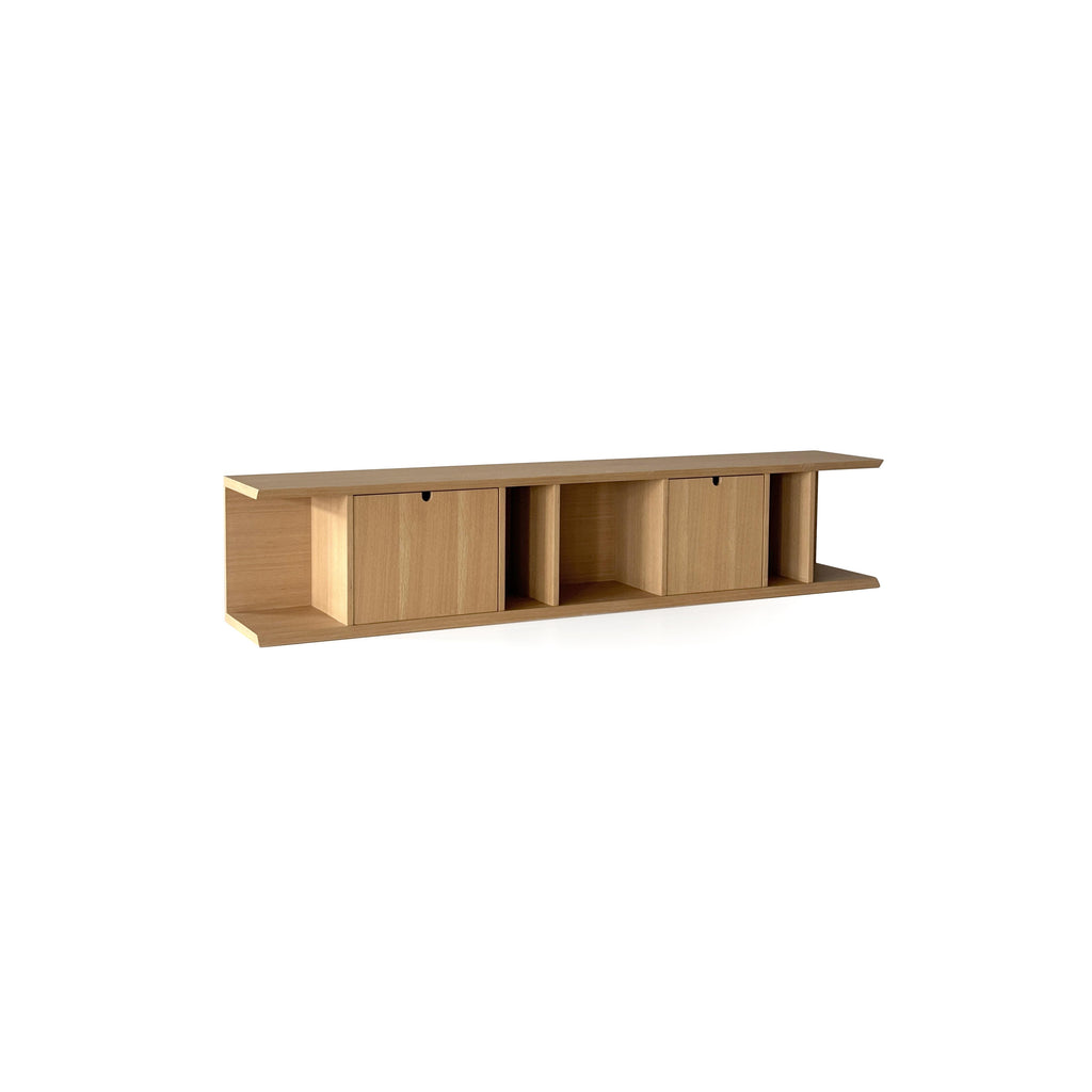 This is a long, low-profile wooden storage unit with two drawers and two open compartments. It features flat-panel doors with black pull handles, a flat top surface, and a lower shelf. Made of light-toned wood with visible grain, it’s designed for organizing items. Category: furniture > storage > shelves and cabinets