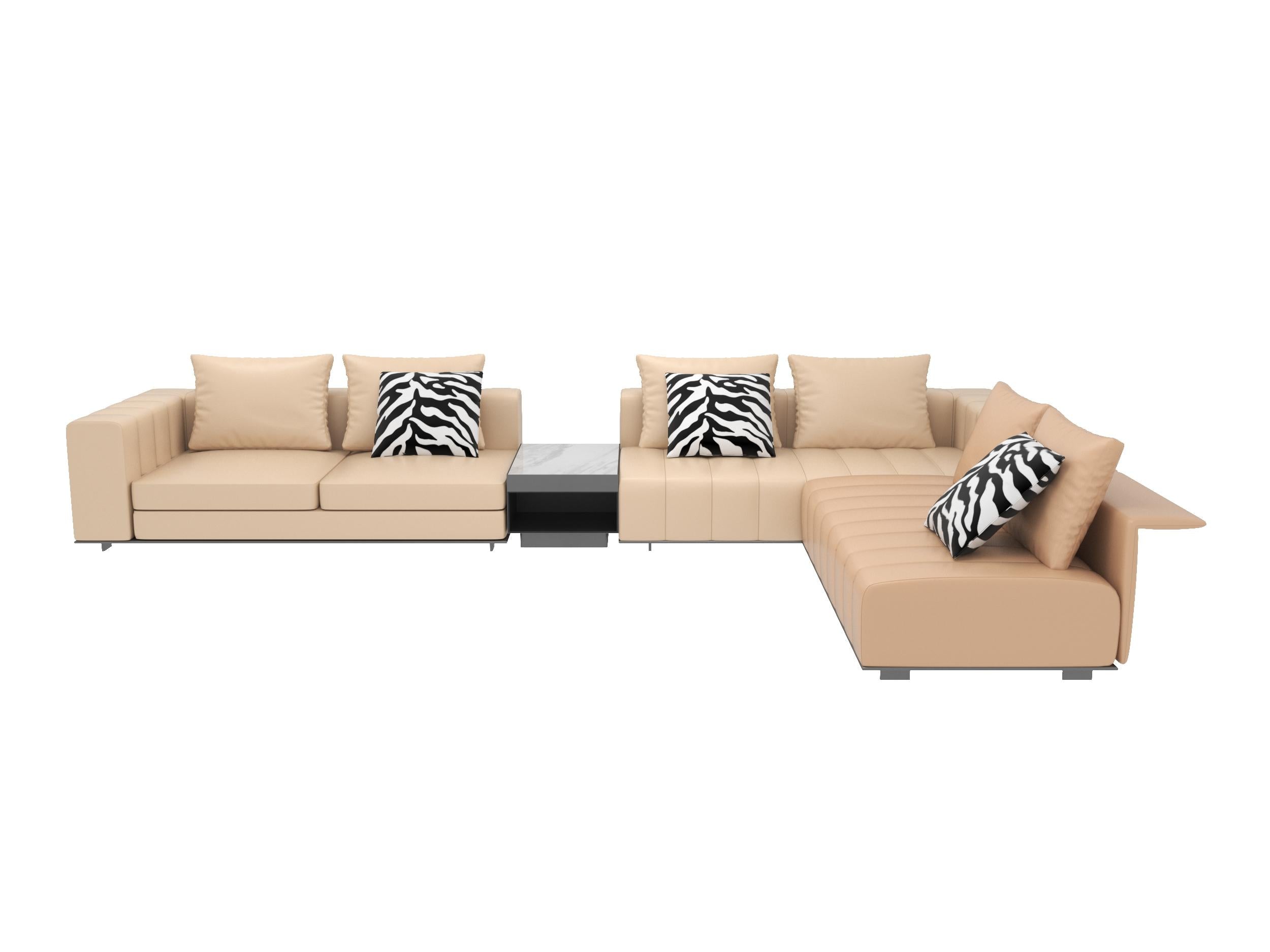 Beige upholstered sectional sofa with tufted backrest, rectangular arms, and segmented cushions; includes three zebra-print pillows; supported by low-profile metal legs; designed for seating and lounging; Category: Furniture > Sofas > Sectionals