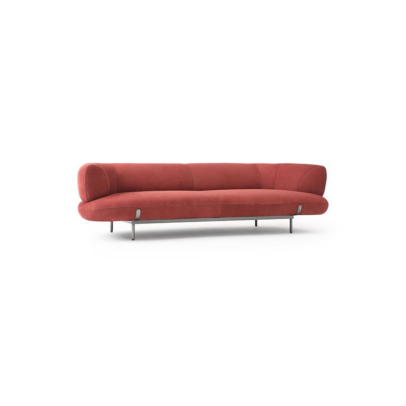 Red upholstered sofa with curved backrest and seat cushions, supported by four slender metal legs; fabric surface shows subtle texture; designed for seating; Category: Furniture > Sofas > Sectionals