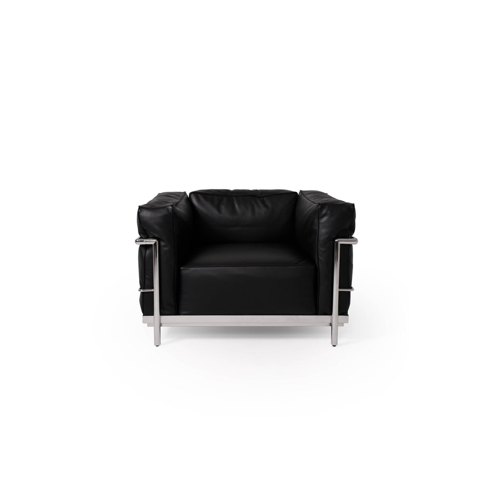 Black leather-like upholstery sofa with three seat cushions and matching backrest, supported by a silver metal frame with vertical armrests and horizontal base rails; designed for seating, featuring clean lines and minimalistic structure. Category: furniture/southern-style-sofas