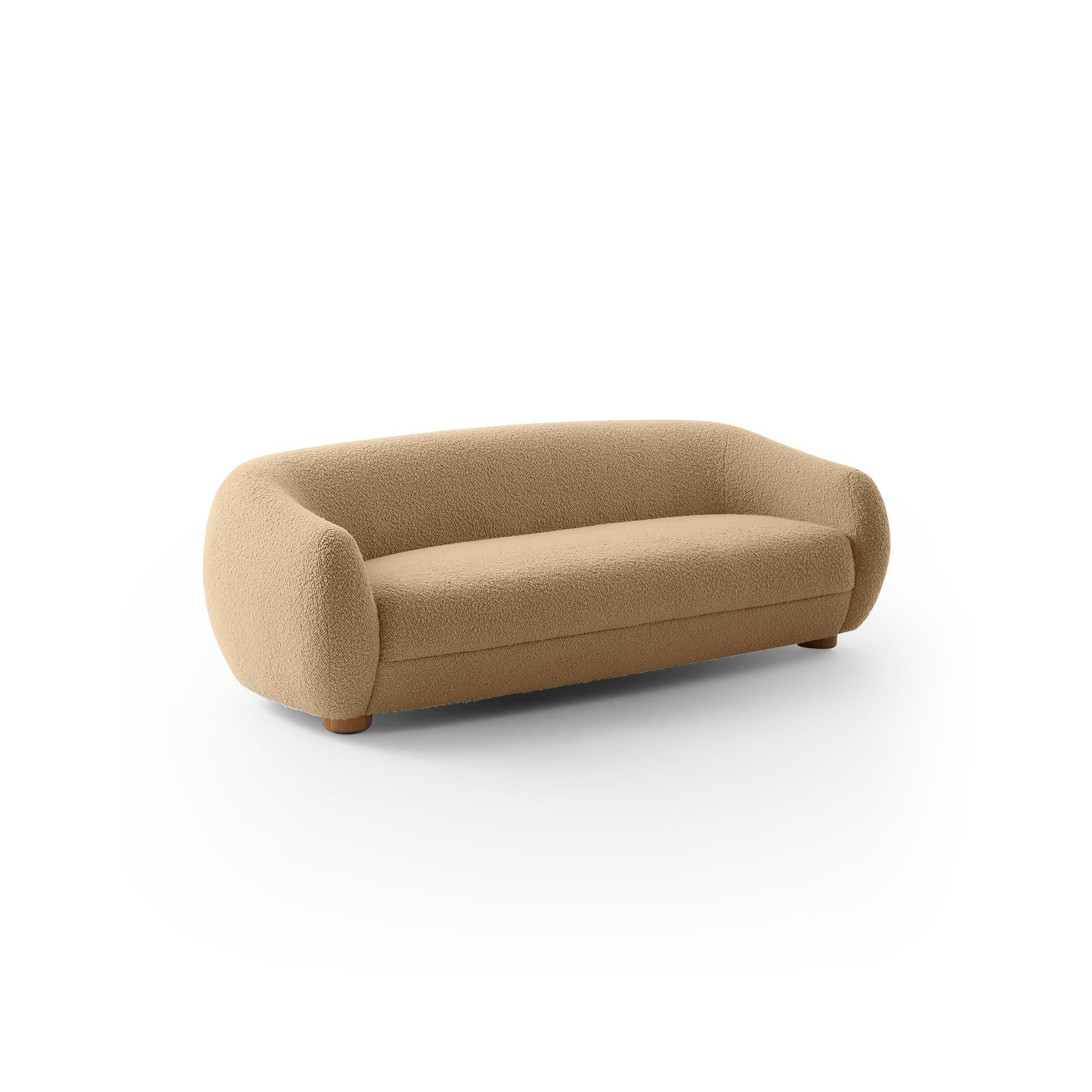 This is a three-seater sofa with rounded arms and a low back, upholstered in a beige, textured fabric. It rests on four small, rounded wooden legs. Designed for seating, it features a continuous cushioned seat and backrest with no visible stitching or fasteners. Category: Furniture > Sofas > Sectionals