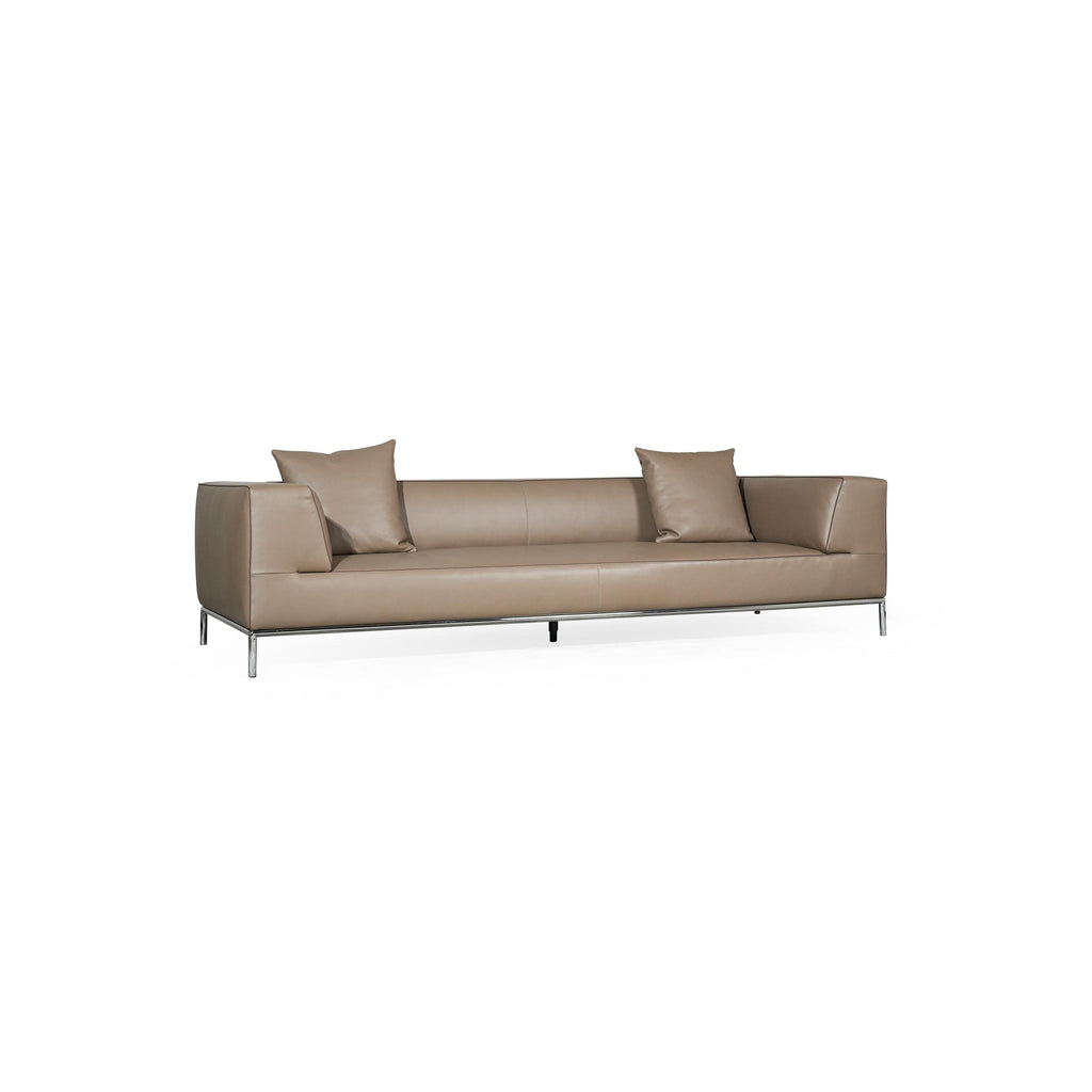 A three-seater sofa with a tan leather-like upholstery, featuring two matching square cushions, rectangular armrests, and a low-profile metal frame with four slender legs. Intended for seating, it has visible stitching along seams and a clean, minimalist silhouette. Category: furniture/southern-style-sofas