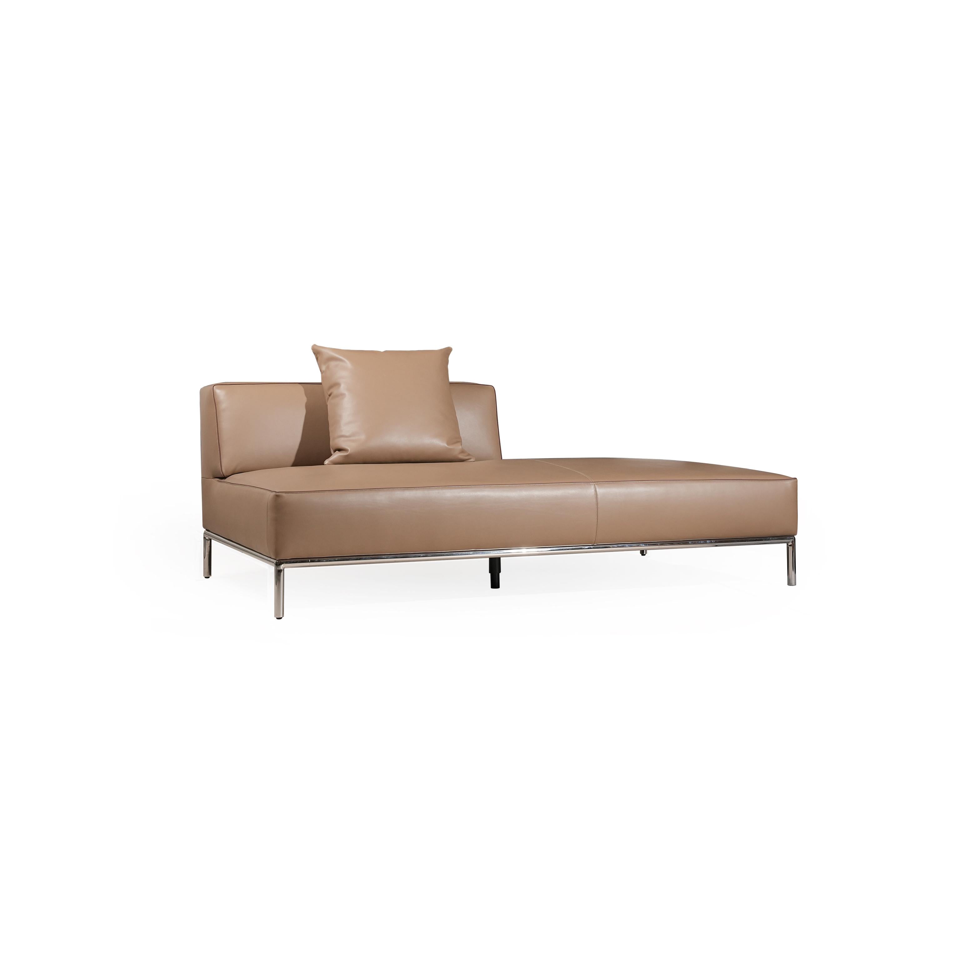 A three-seater sofa with a tan leather-like upholstery, featuring two matching square cushions, rectangular armrests, and a low-profile metal frame with four slender legs. Intended for seating, it has visible stitching along seams and a clean, minimalist silhouette. Category: furniture/southern-style-sofas