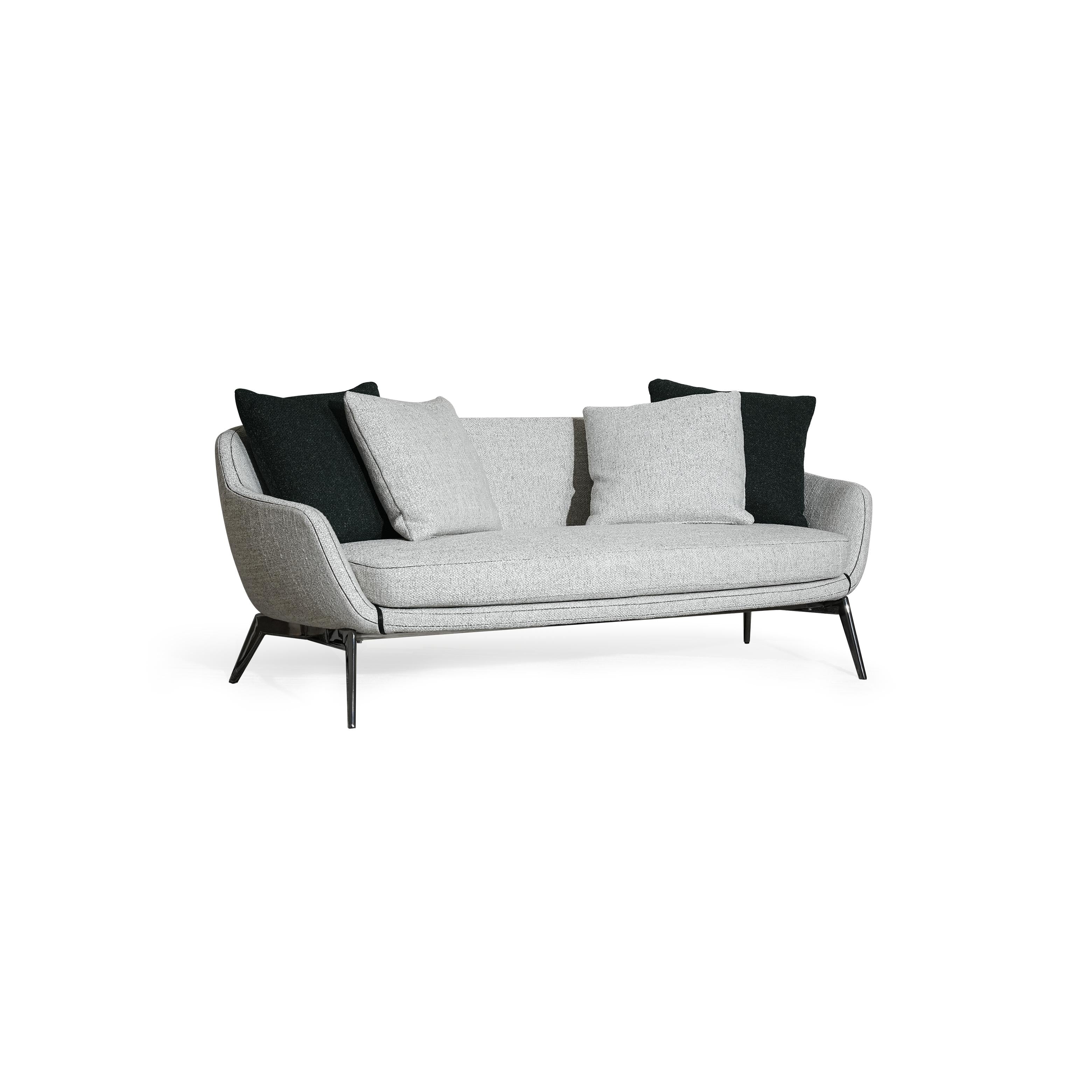 A two-seater sofa with light gray fabric upholstery and black accent pillows, featuring curved armrests, a low-profile backrest, and thin black metal legs. The seat and back cushions are visibly padded with matching fabric. Category: furniture/soups/sofas