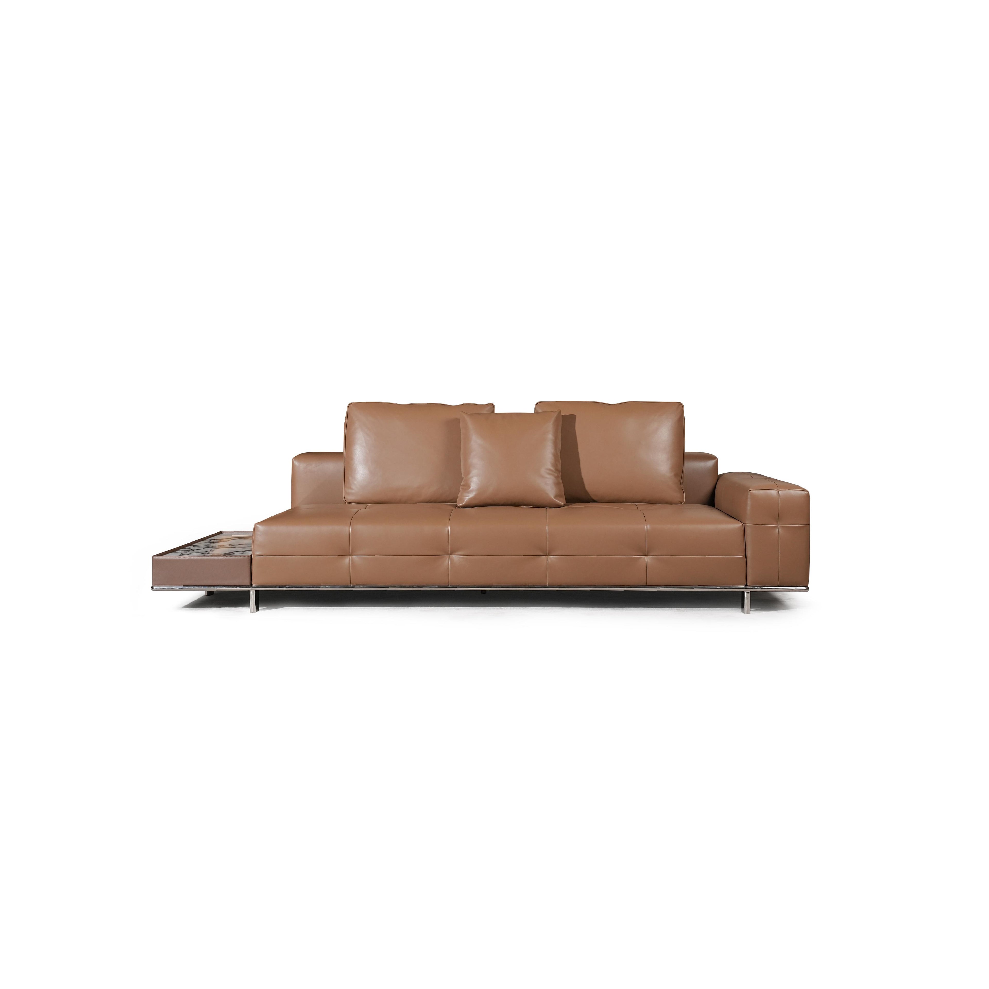 Modern sectional sofa with two-tone upholstery: left side in light textured fabric, right side in tan leather-like material. Features segmented backrests, square cushioned arms, low-profile metal legs, and distinct stitching. Designed for seating and lounging. Category: furniture/sofas